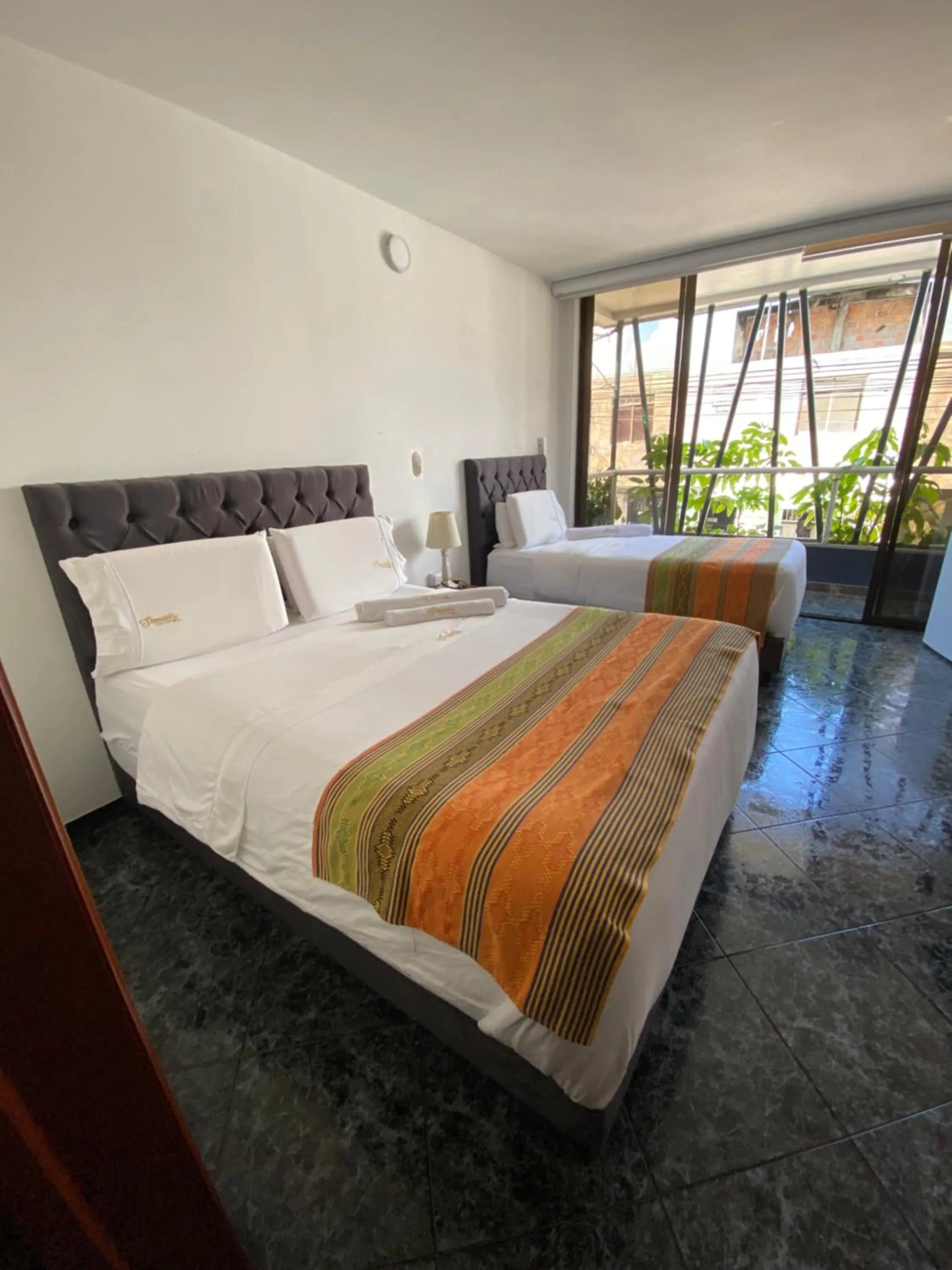 Bed in Samalá Casa Hotel