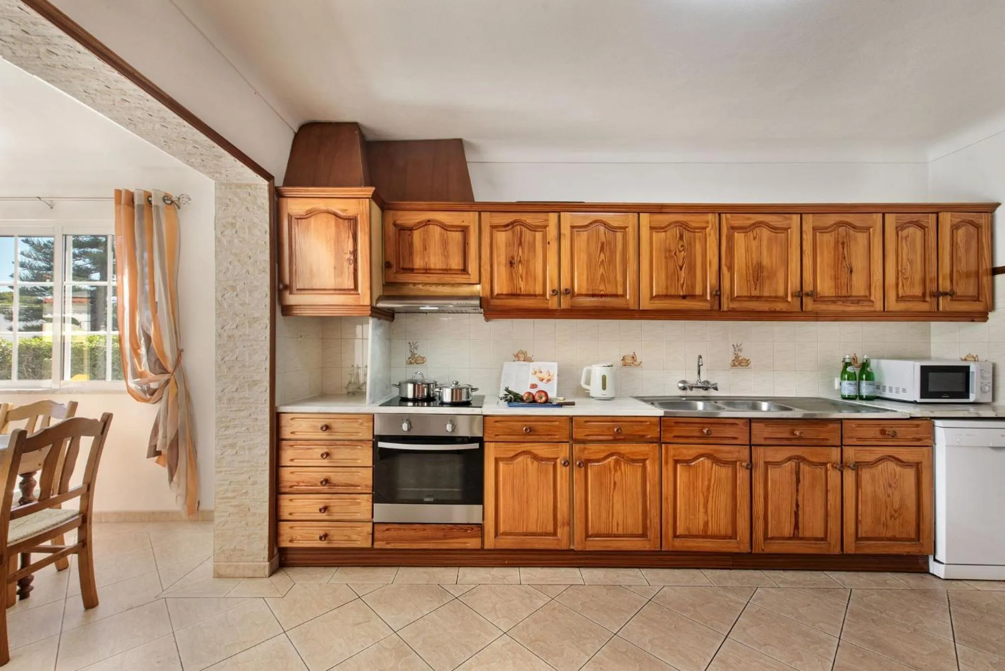kitchen in A Fantastic Place for Families, Hilton Hotel are and close to amenities