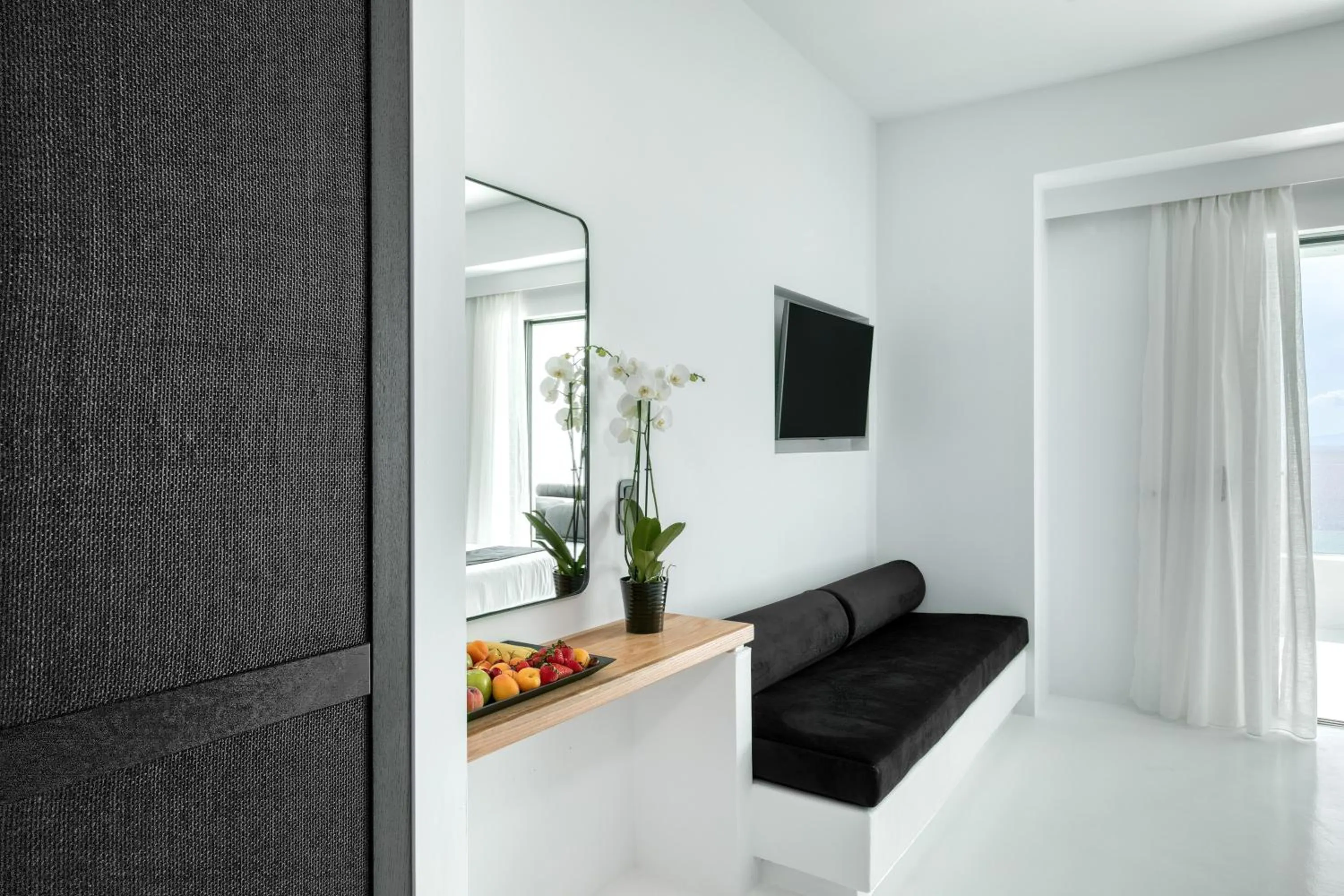 Seating area in Tagoo Black Mykonos