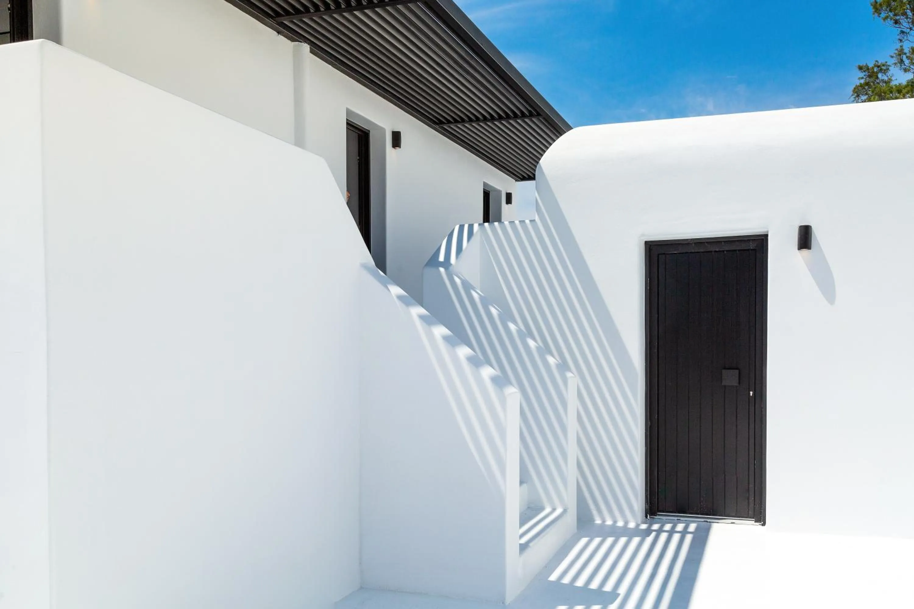 Property building in Tagoo Black Mykonos