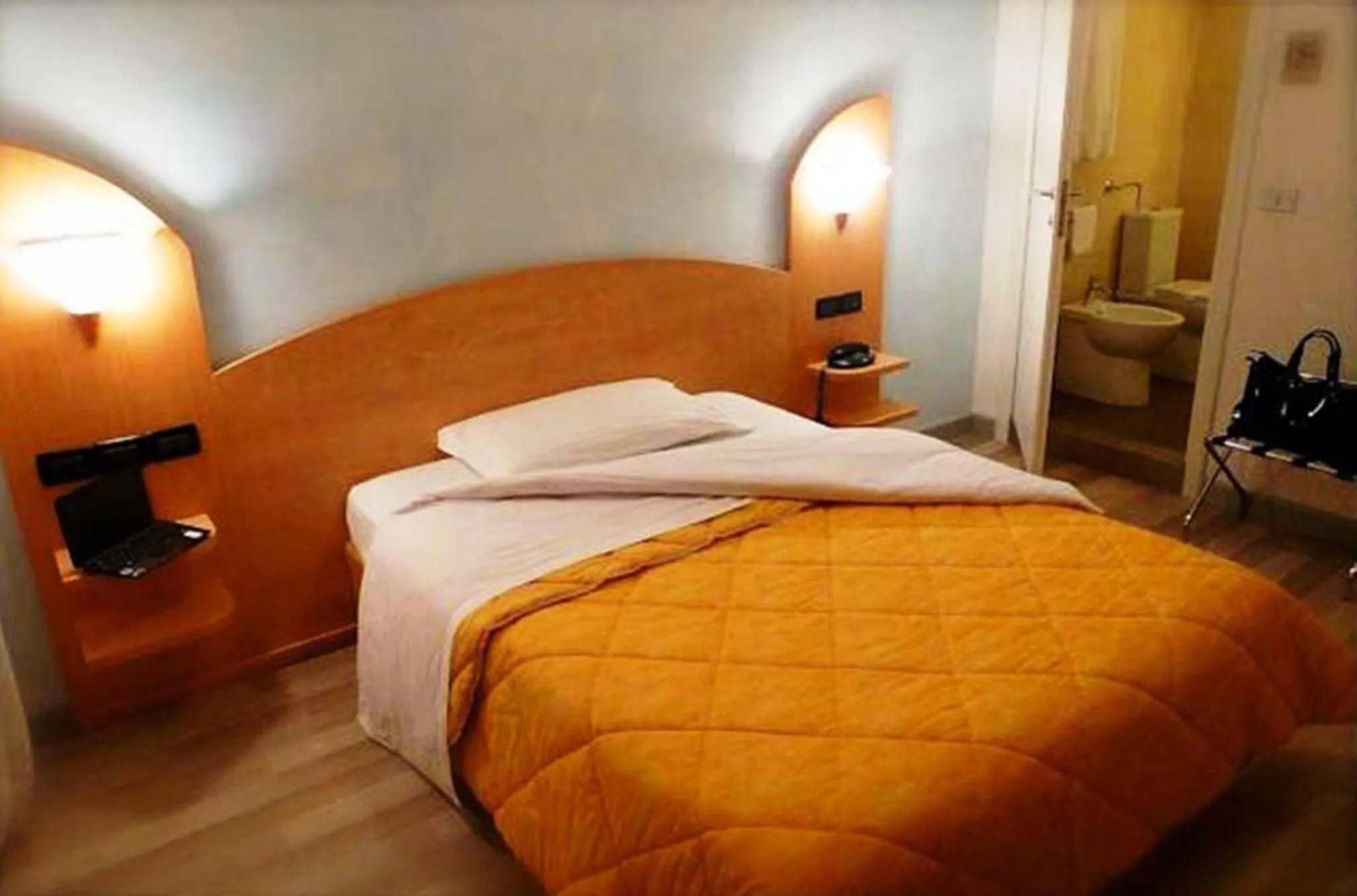 Photo of the whole room, Bed in Hotel Mirella e Ristorante Bar Don Bacco