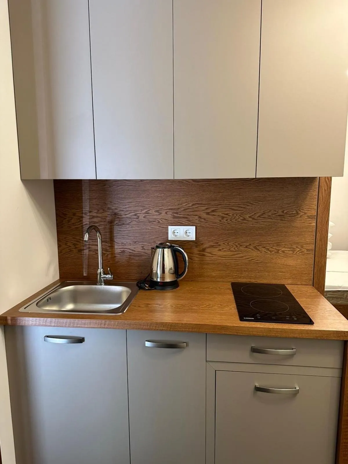 Kitchen or kitchenette in R&R Hotel