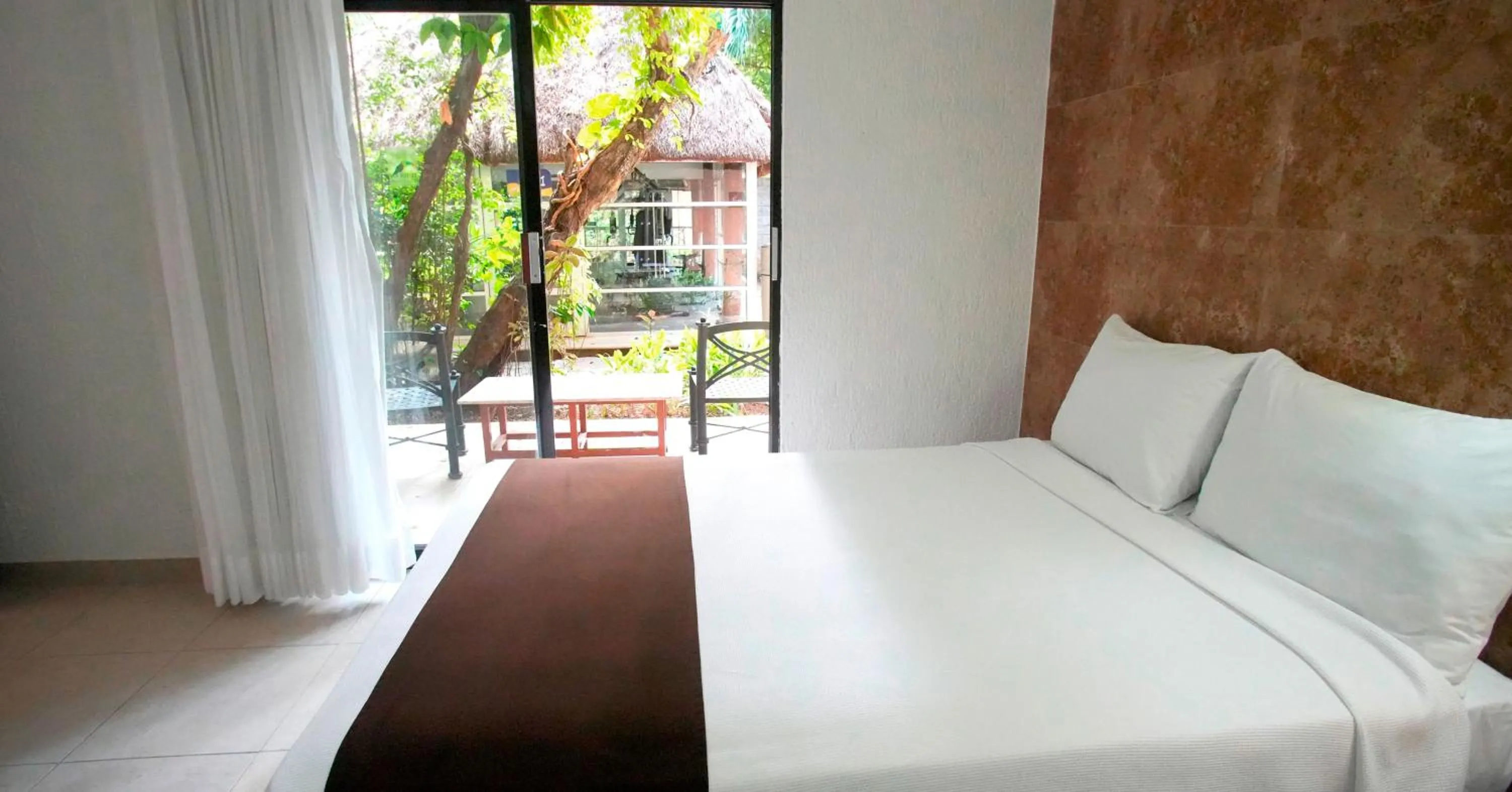 Bed in Tukan Hotel Playa del Carmen