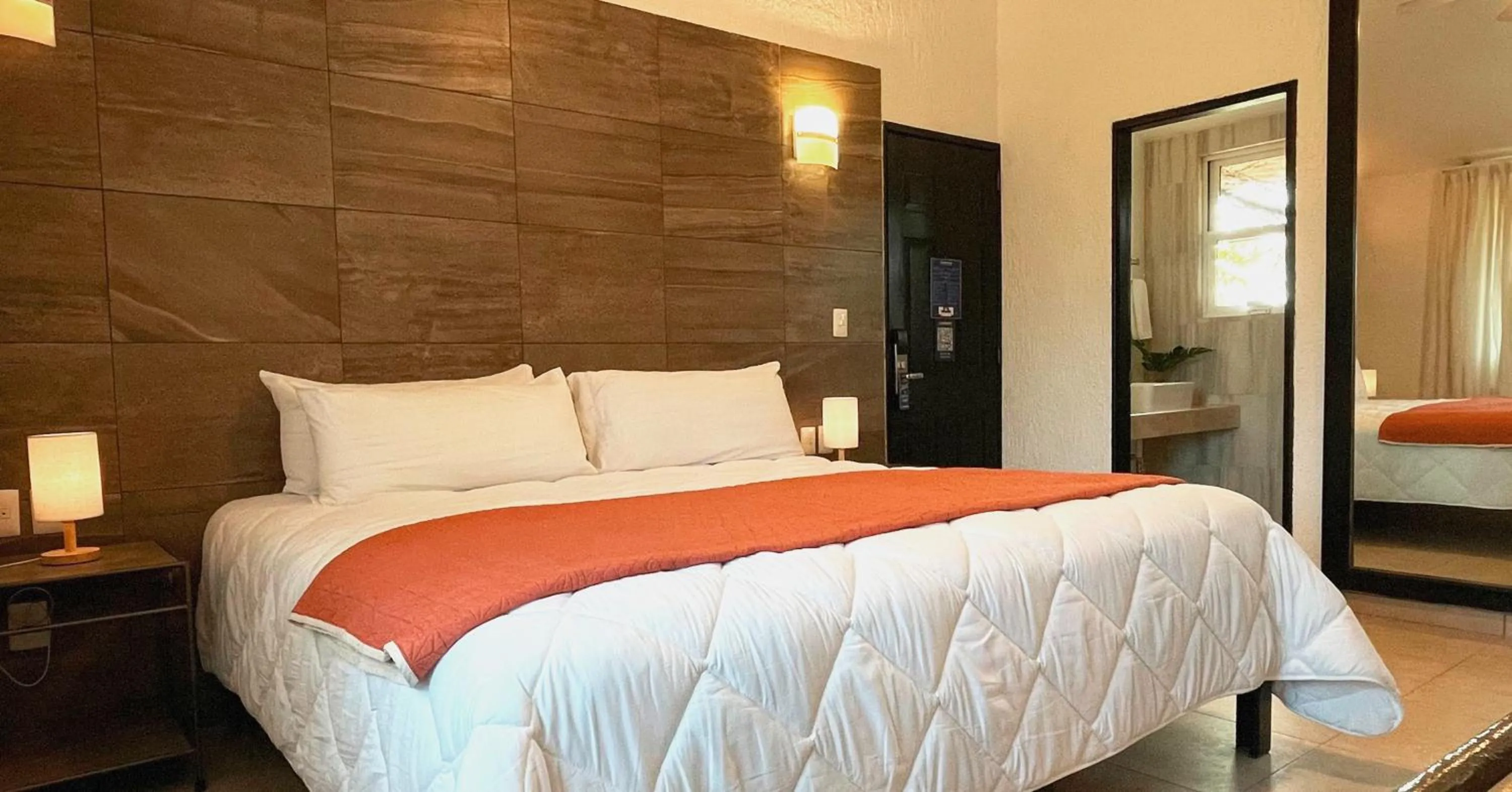 Bed in Tukan Hotel Playa del Carmen