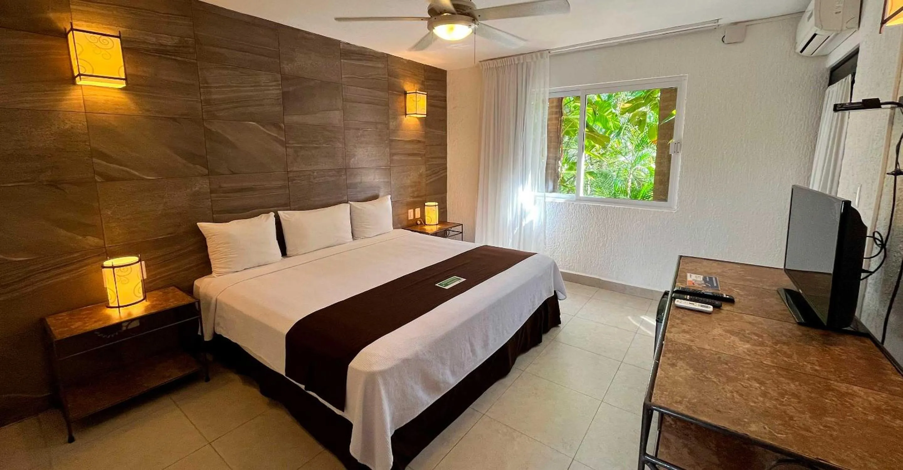 Bed in Tukan Hotel Playa del Carmen