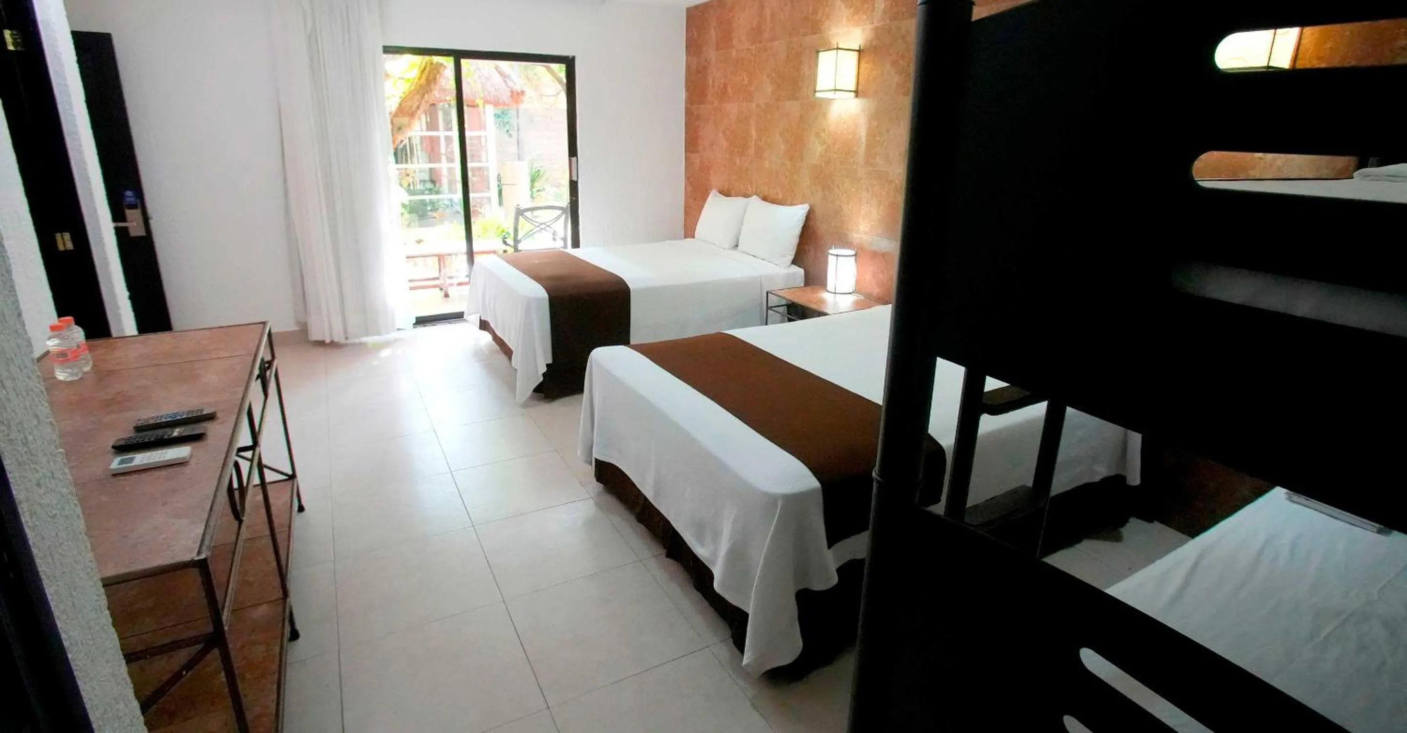 Bed in Tukan Hotel Playa del Carmen