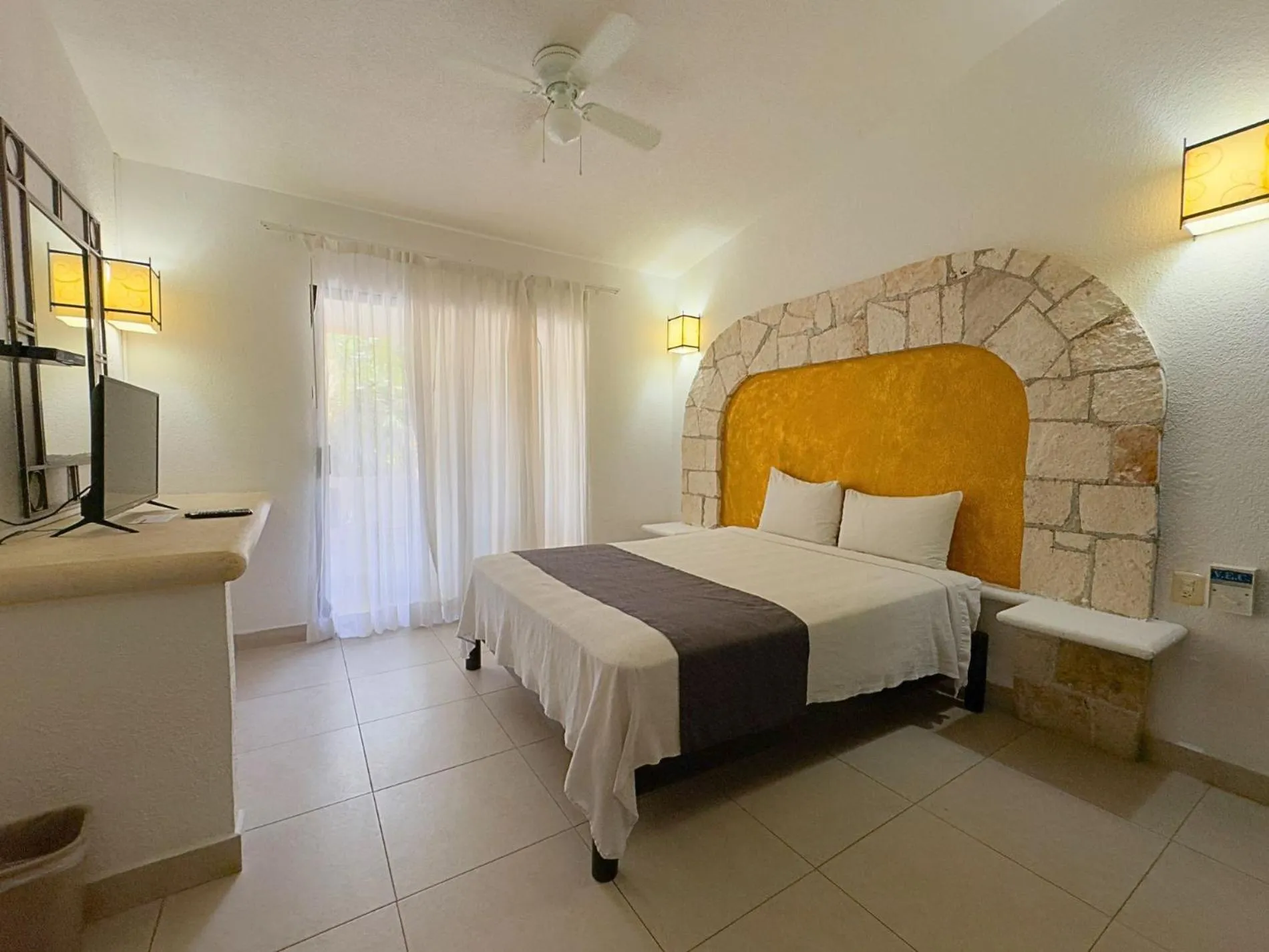 Bed in Tukan Hotel Playa del Carmen