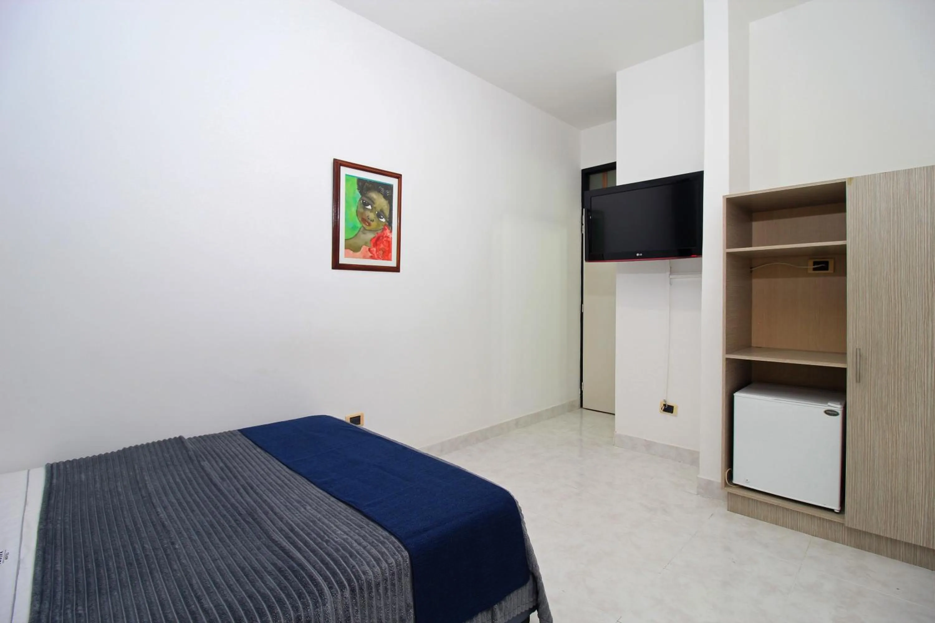 Bed in Hotel Emberá