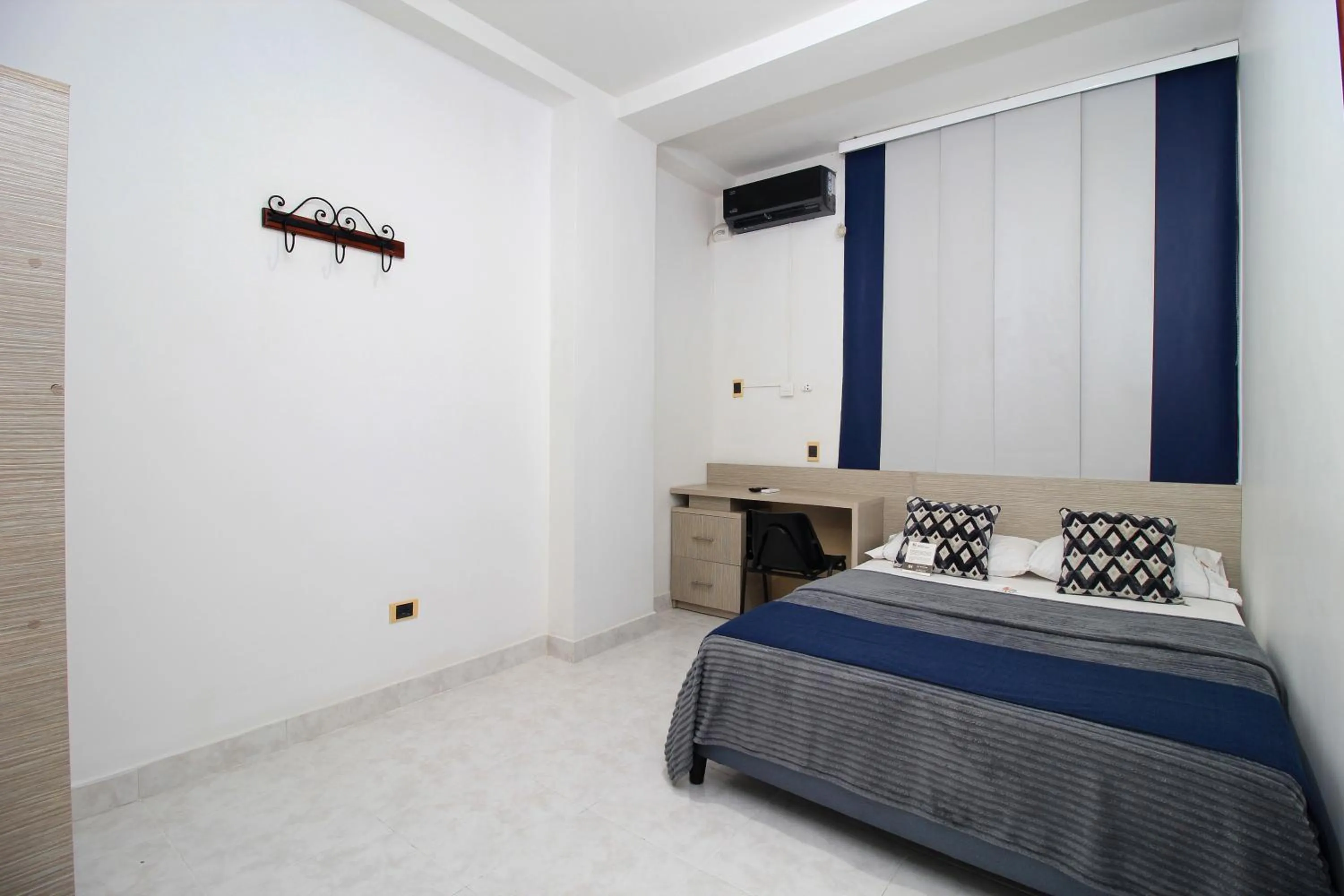 Bed in Hotel Emberá