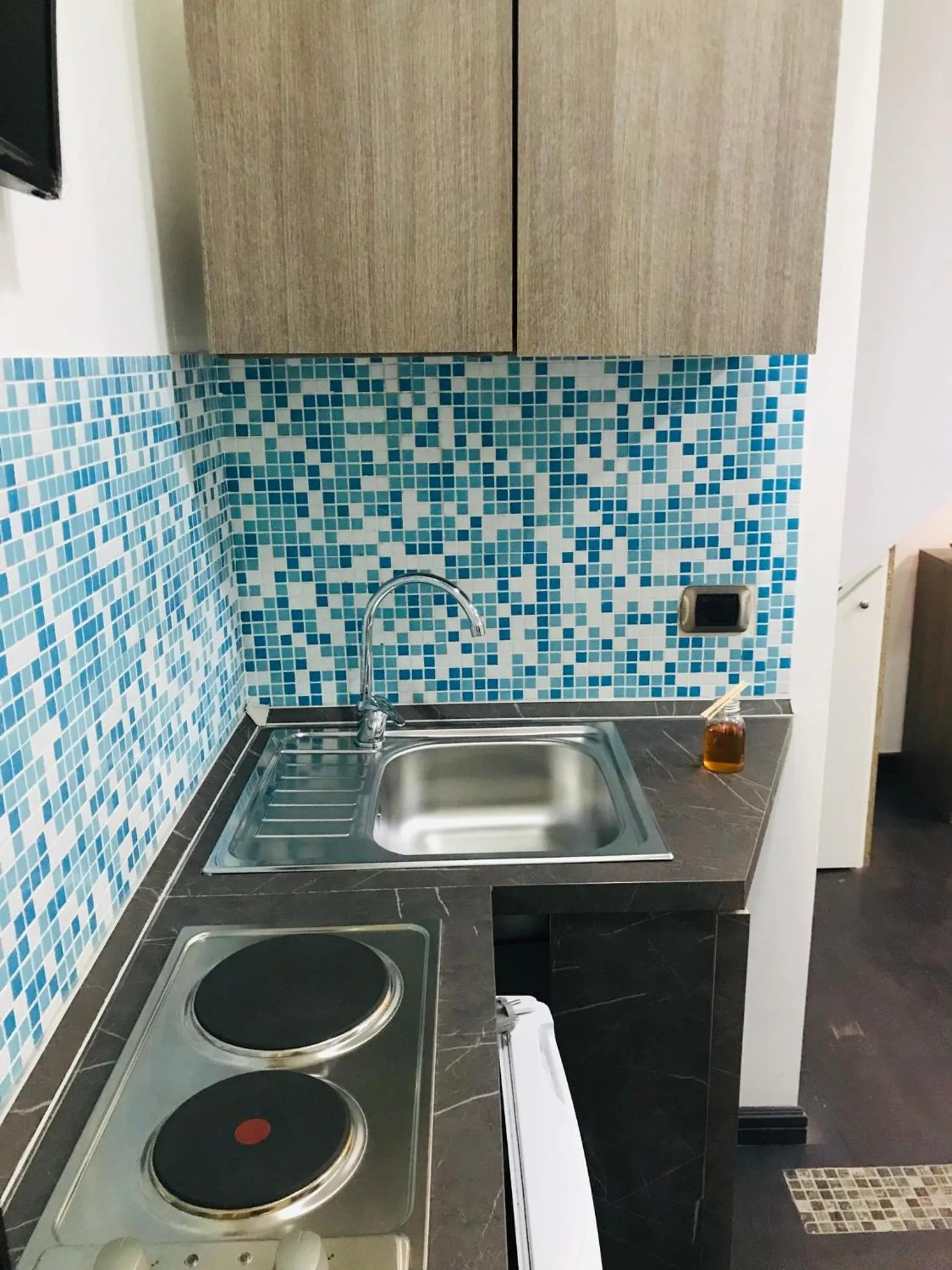 Kitchen or kitchenette in Vacanze Partenopee