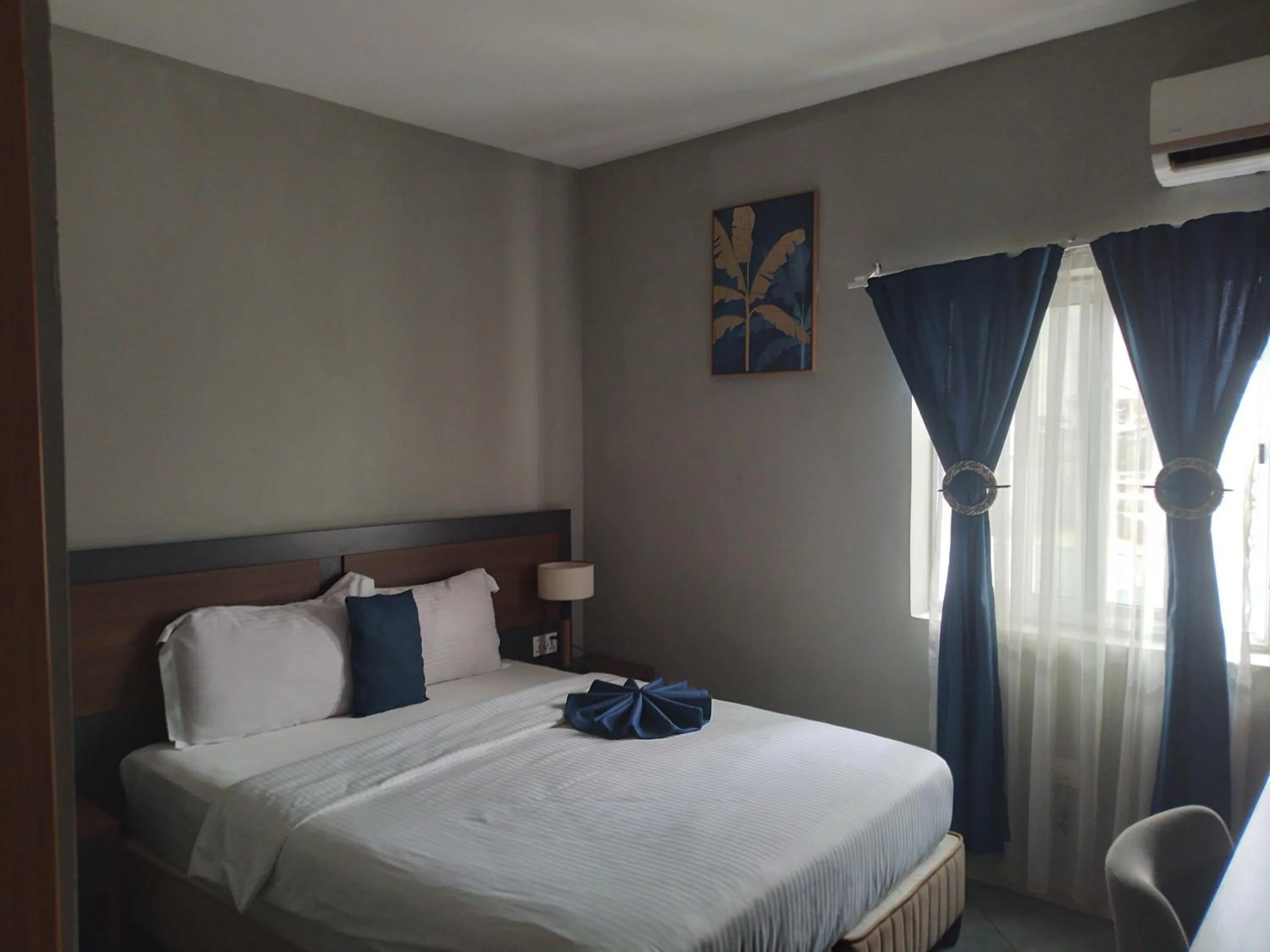 Bed in Euro Homes Hotel