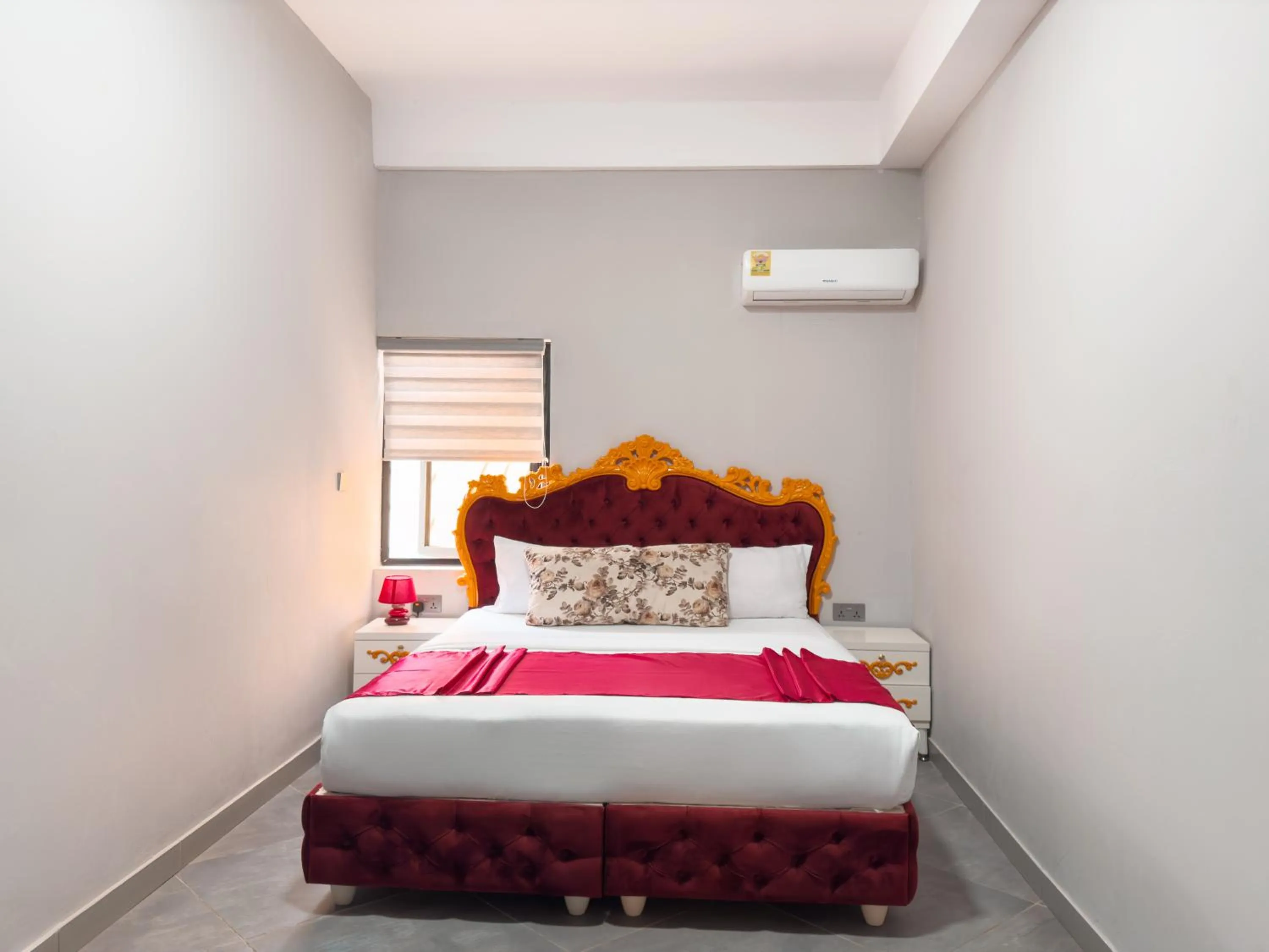 Bed in Euro Homes Hotel