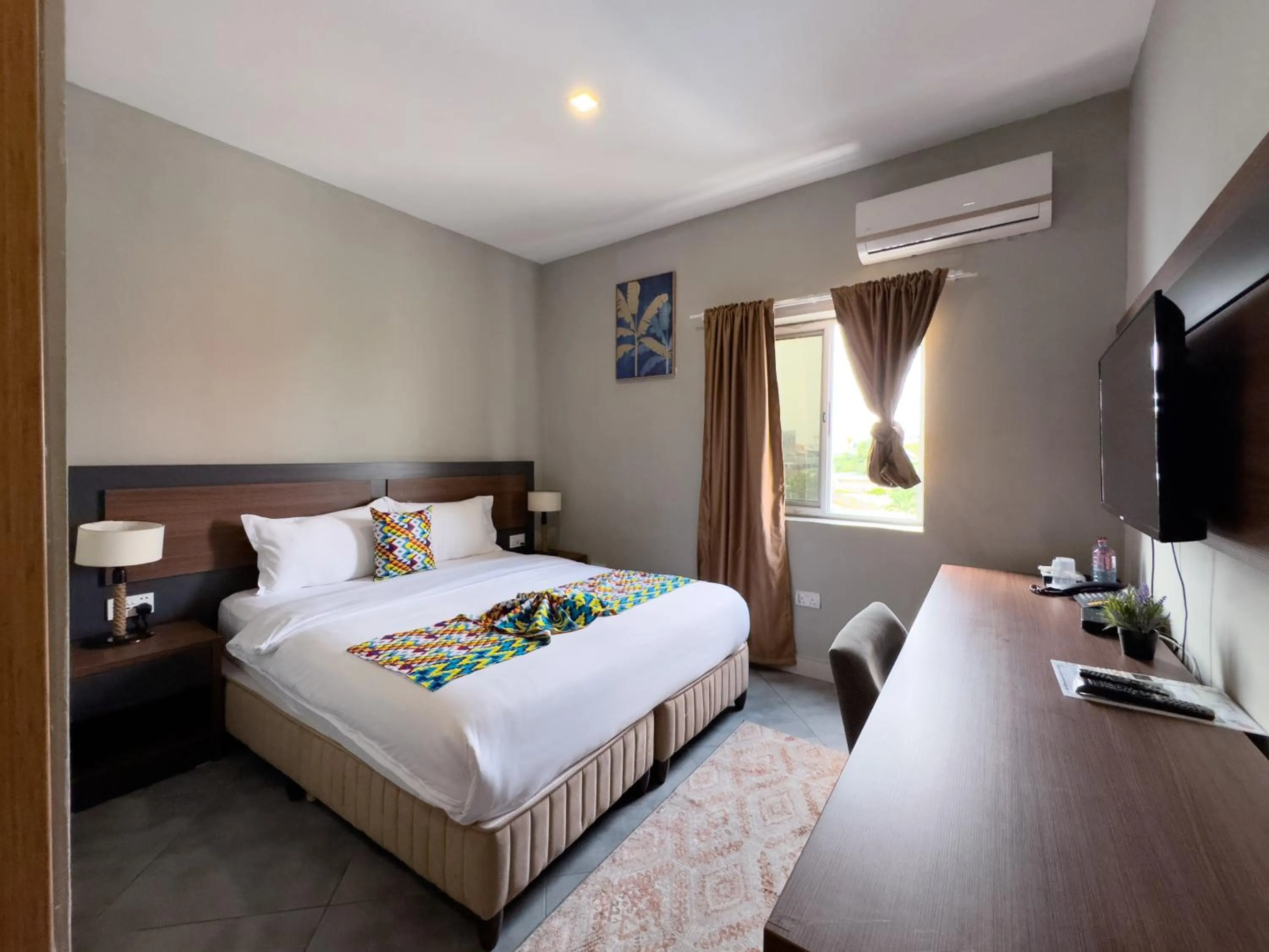 Bed in Euro Homes Hotel