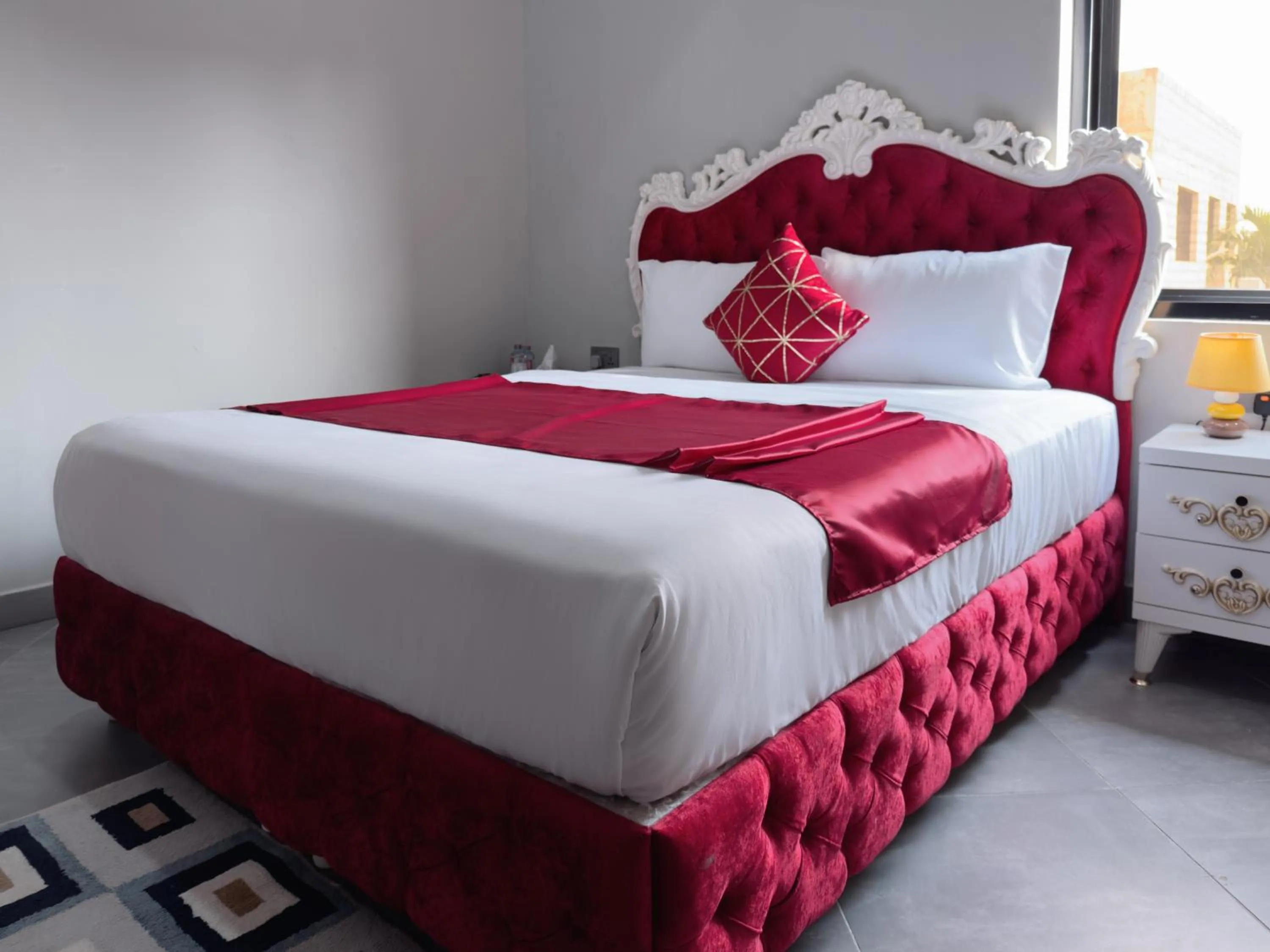 Bed in Euro Homes Hotel