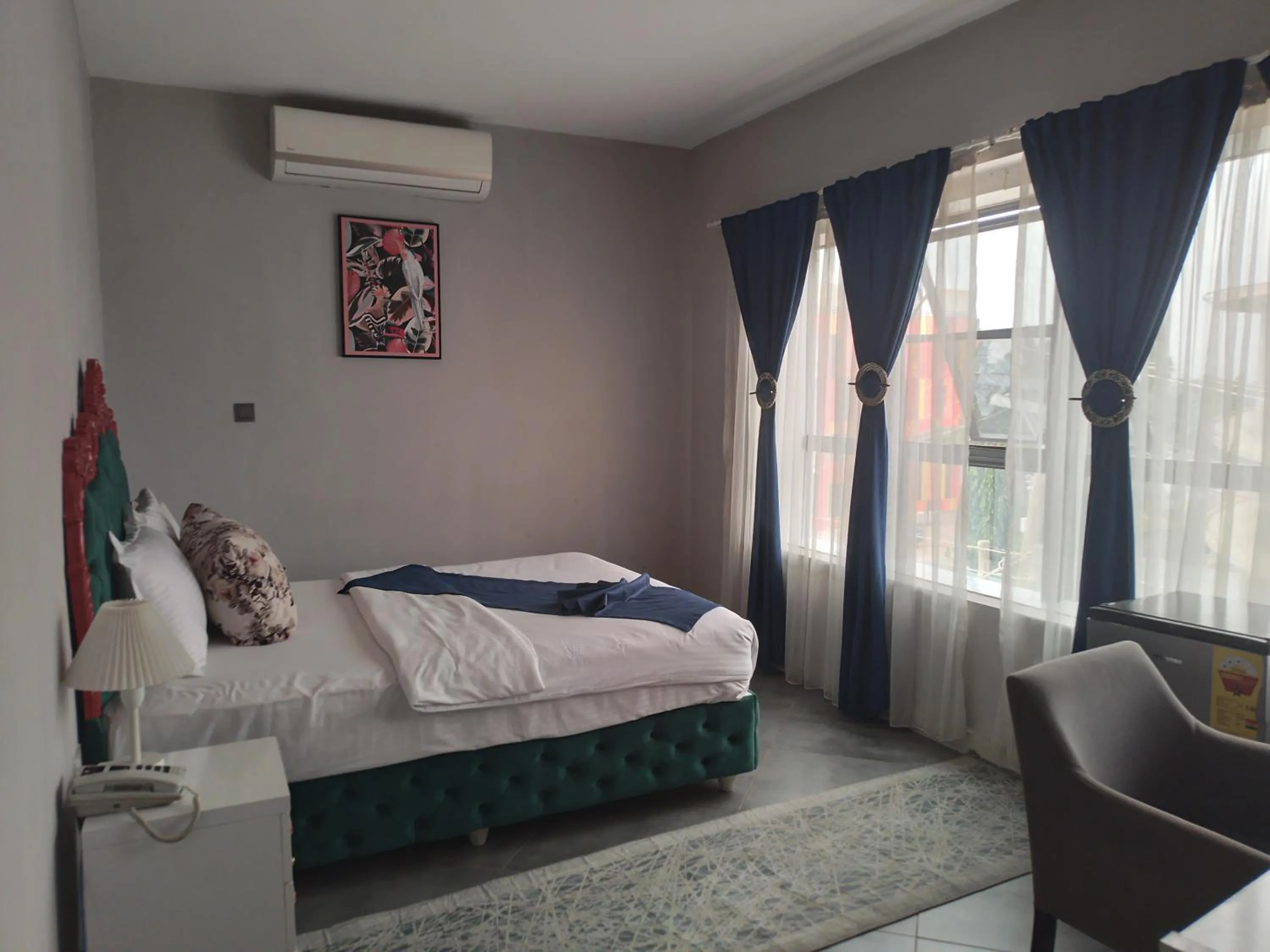 Bed in Euro Homes Hotel