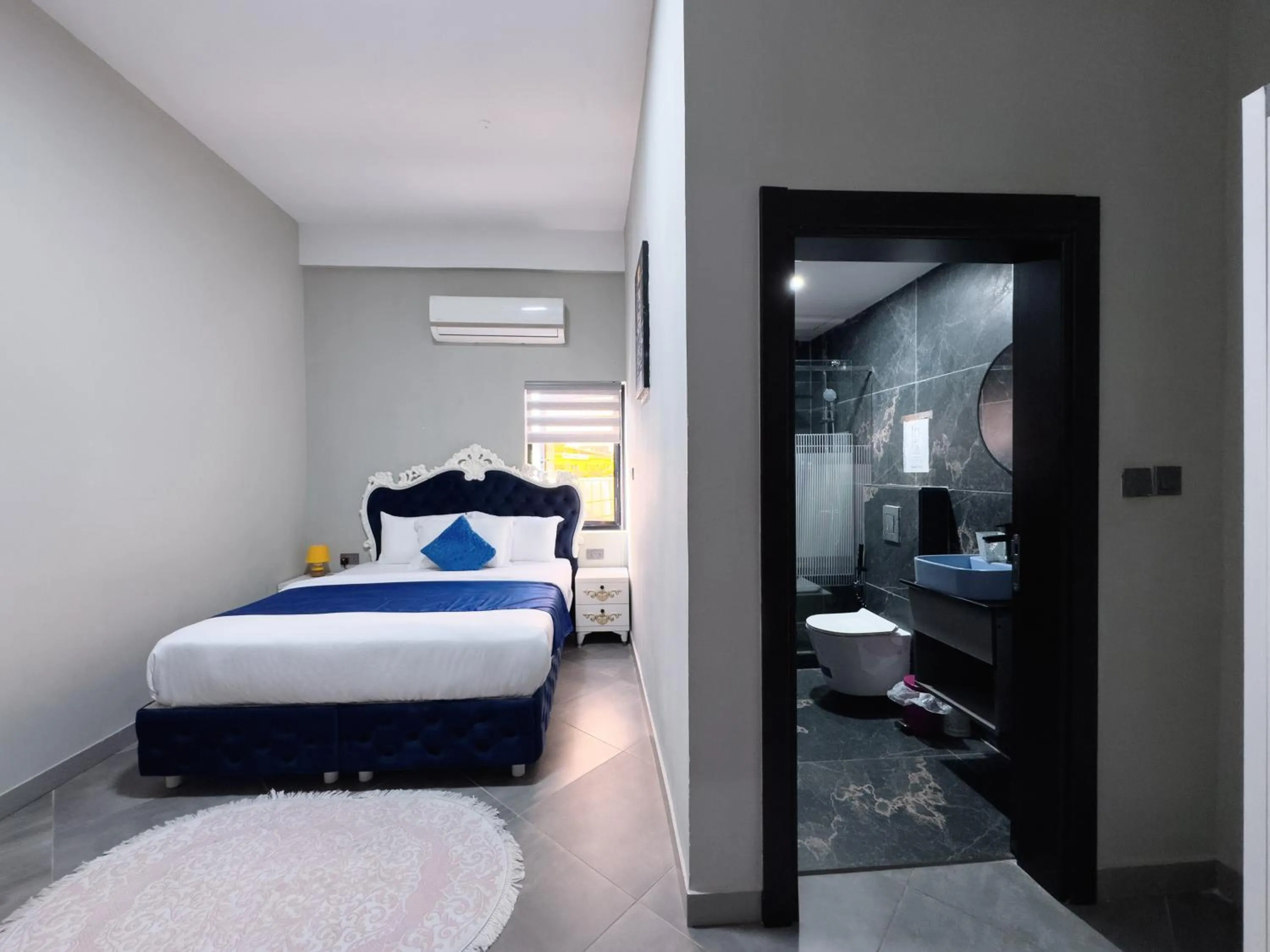 Bed in Euro Homes Hotel