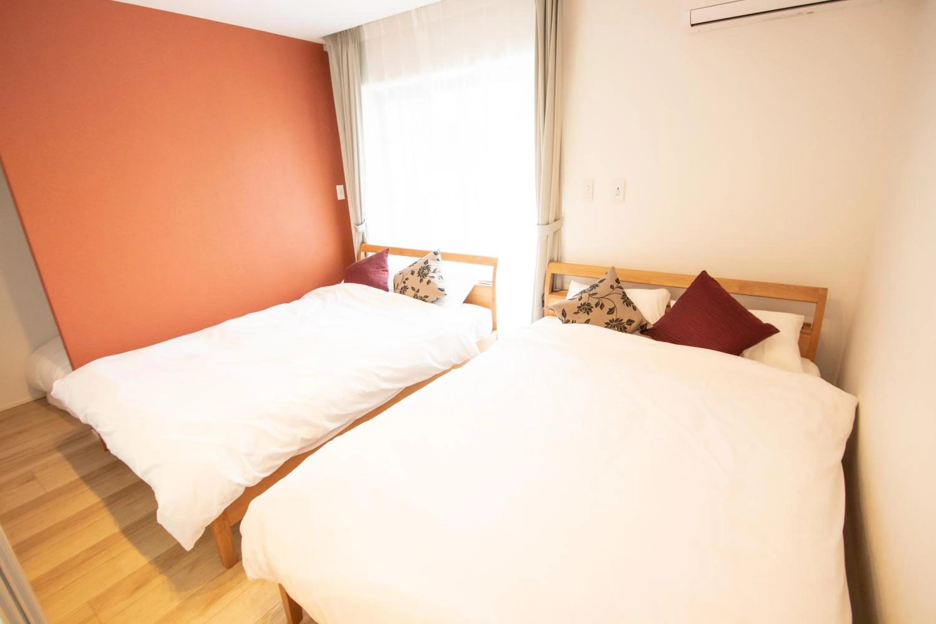 Bed in Apartment Hotel Tenjin TUMUGU