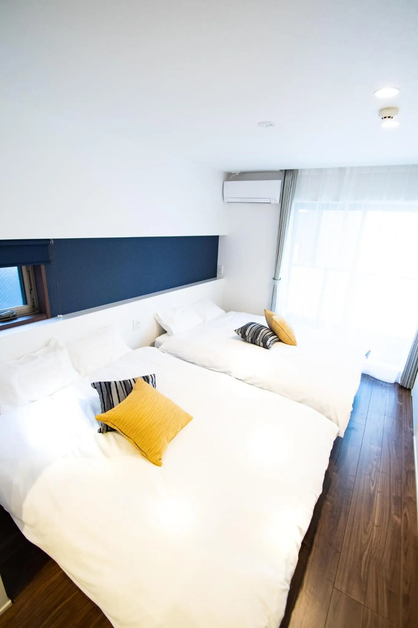 Bed in Apartment Hotel Tenjin TUMUGU