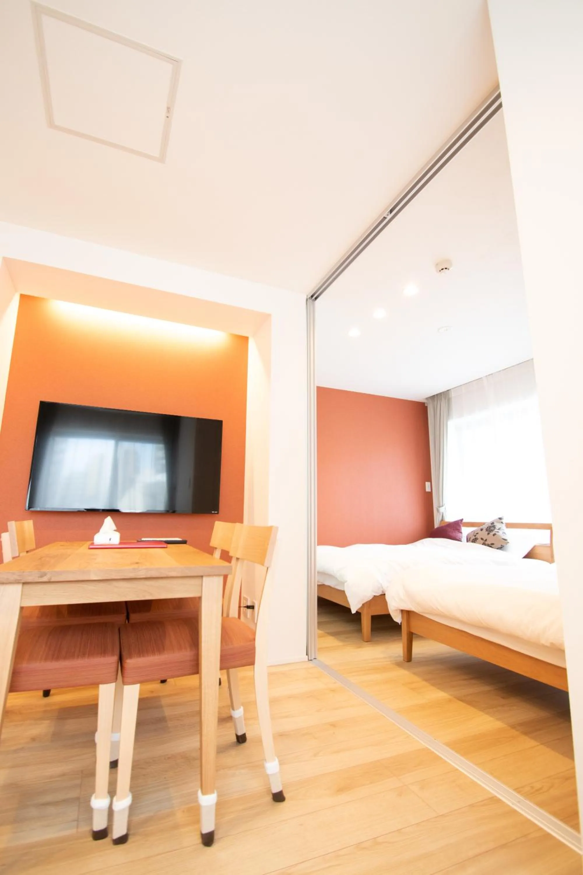 Bed in Apartment Hotel Tenjin TUMUGU