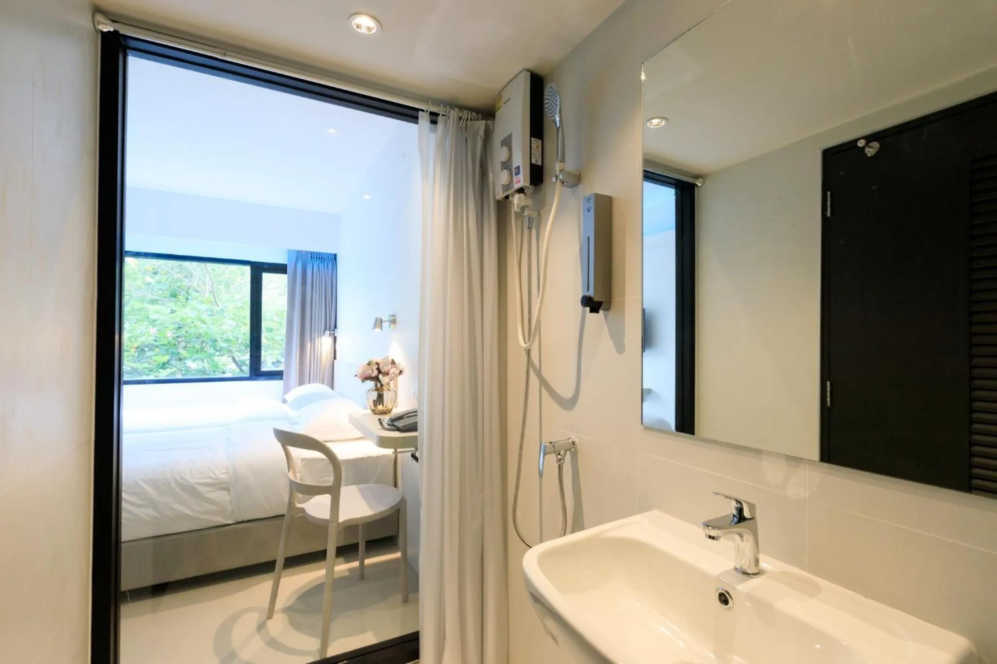 Bathroom, Bed in Prima House Pattaya