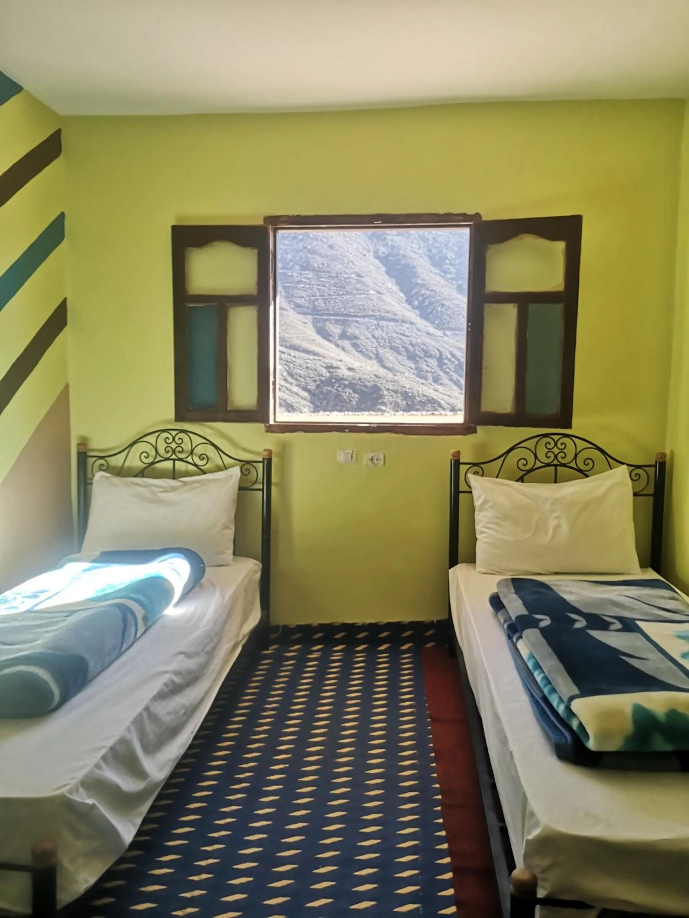 Bed in Gite Angour Tacheddirt