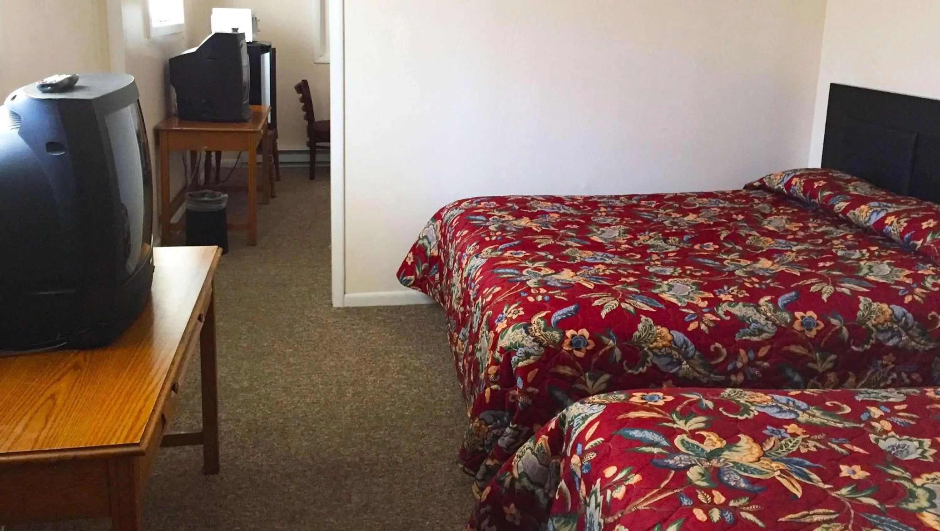 Photo of the whole room, Bed in Country Place Inn and Suites White Haven