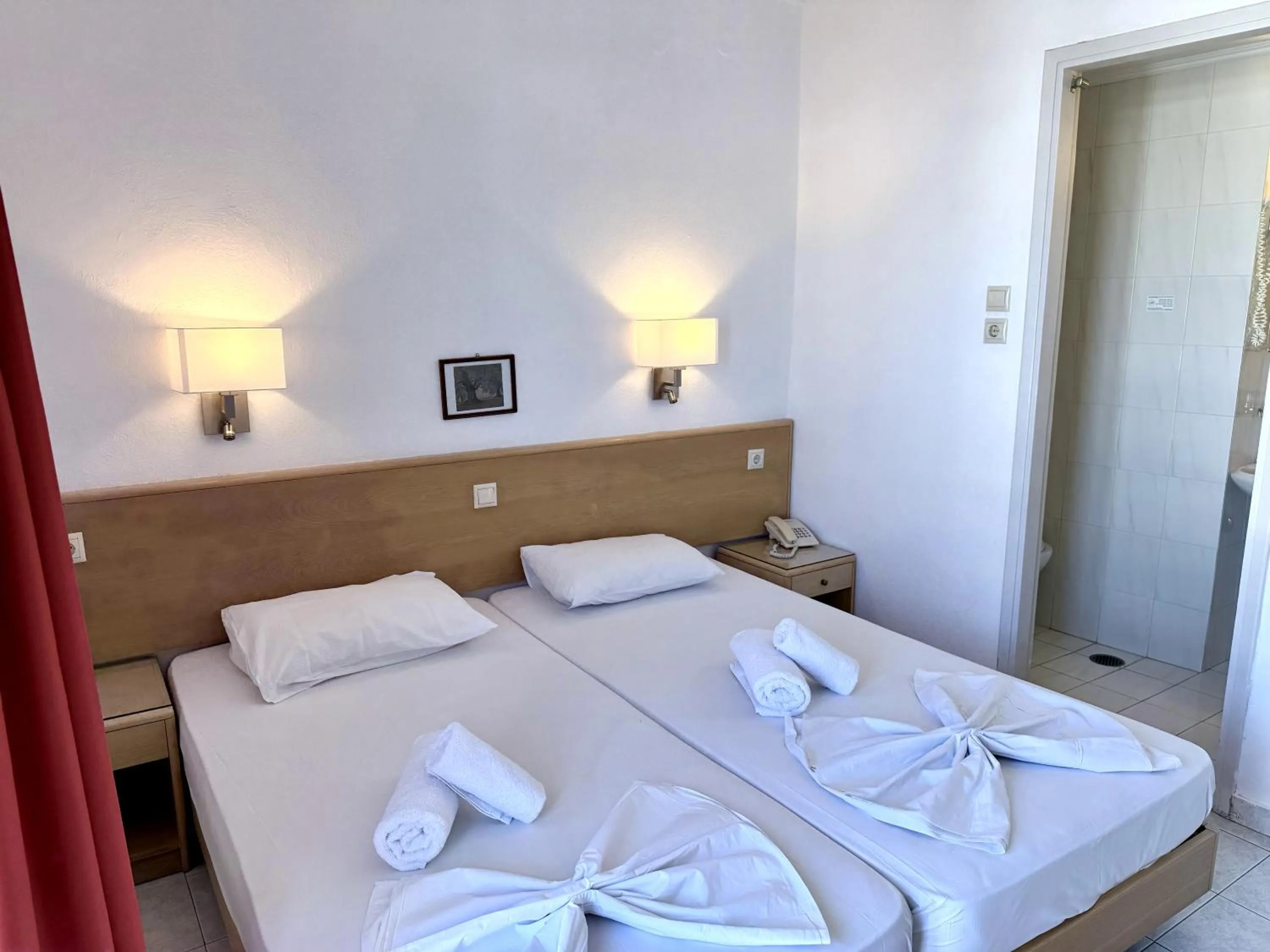 Bed in Savoy City Hotel