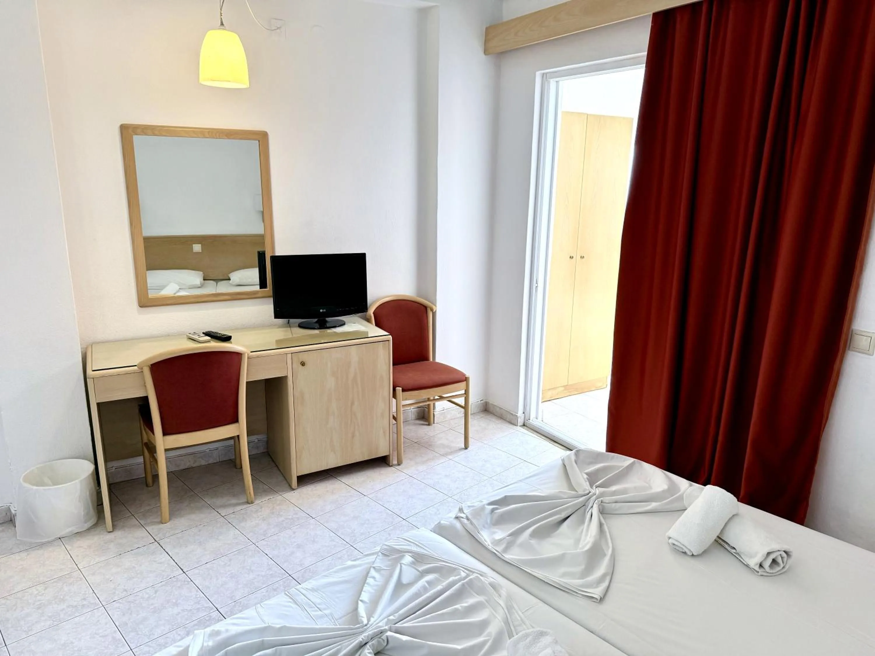 Bed in Savoy City Hotel