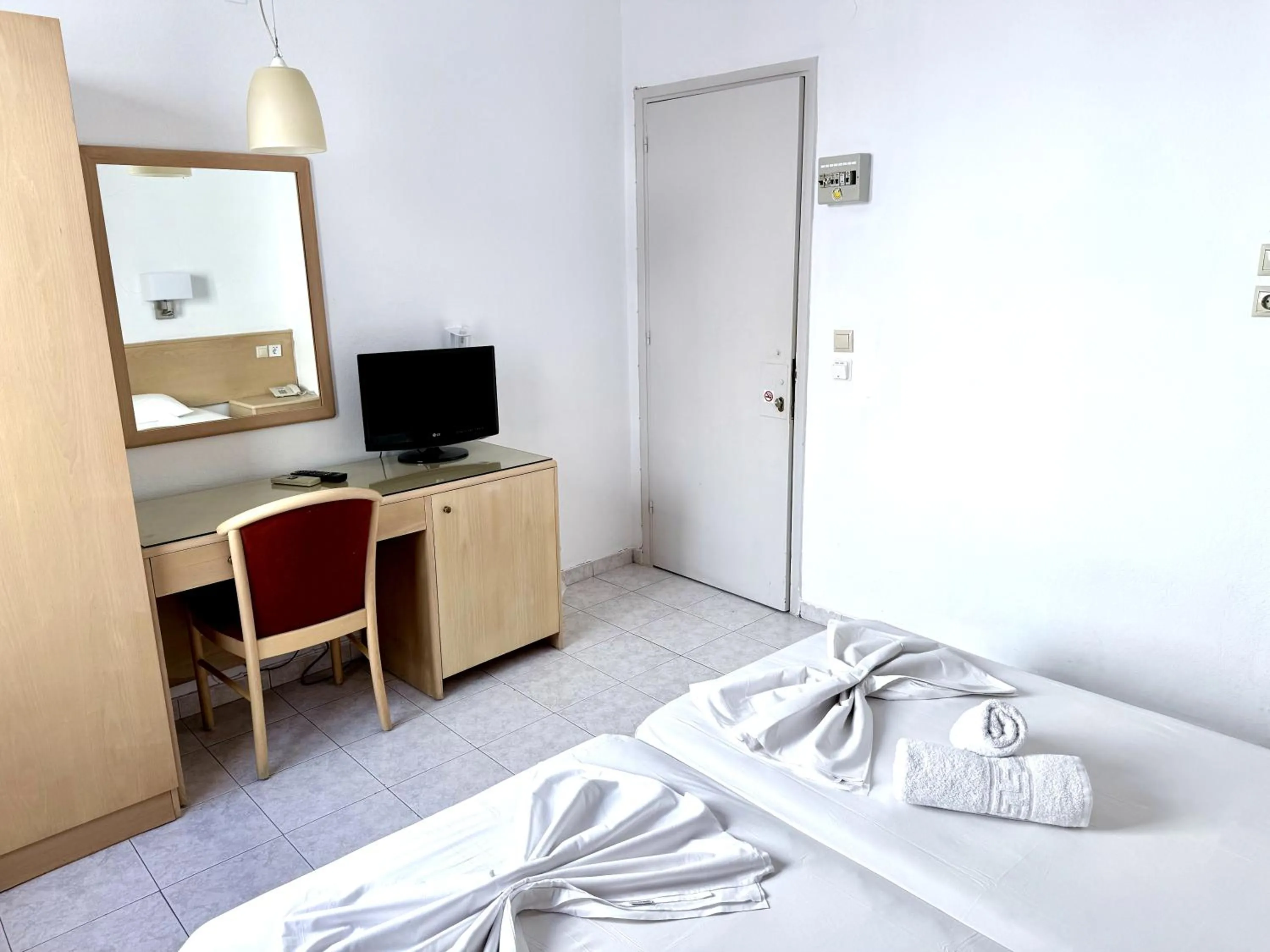 Bed in Savoy City Hotel