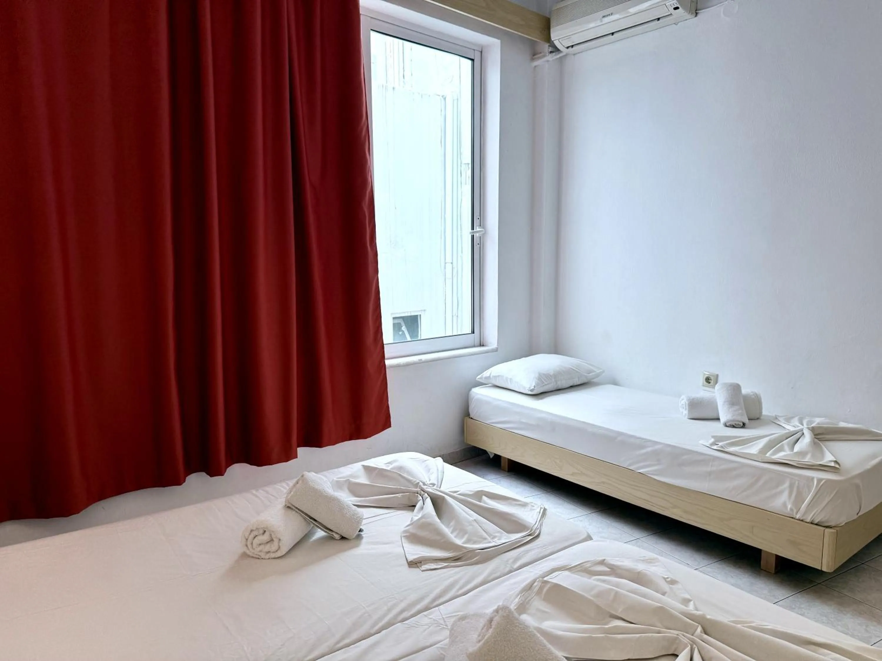 Bed in Savoy City Hotel