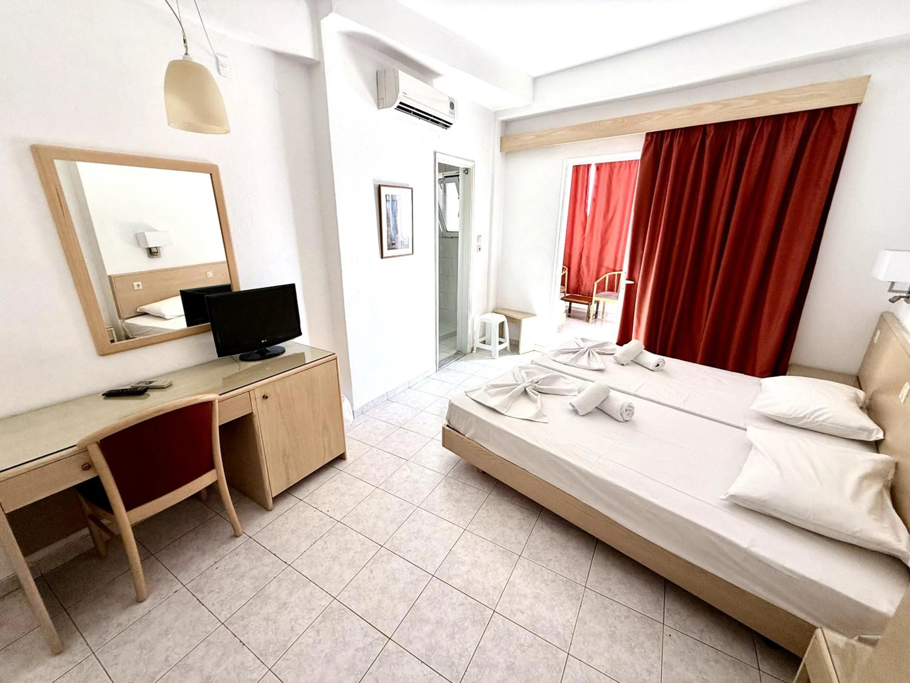 Bed in Savoy City Hotel