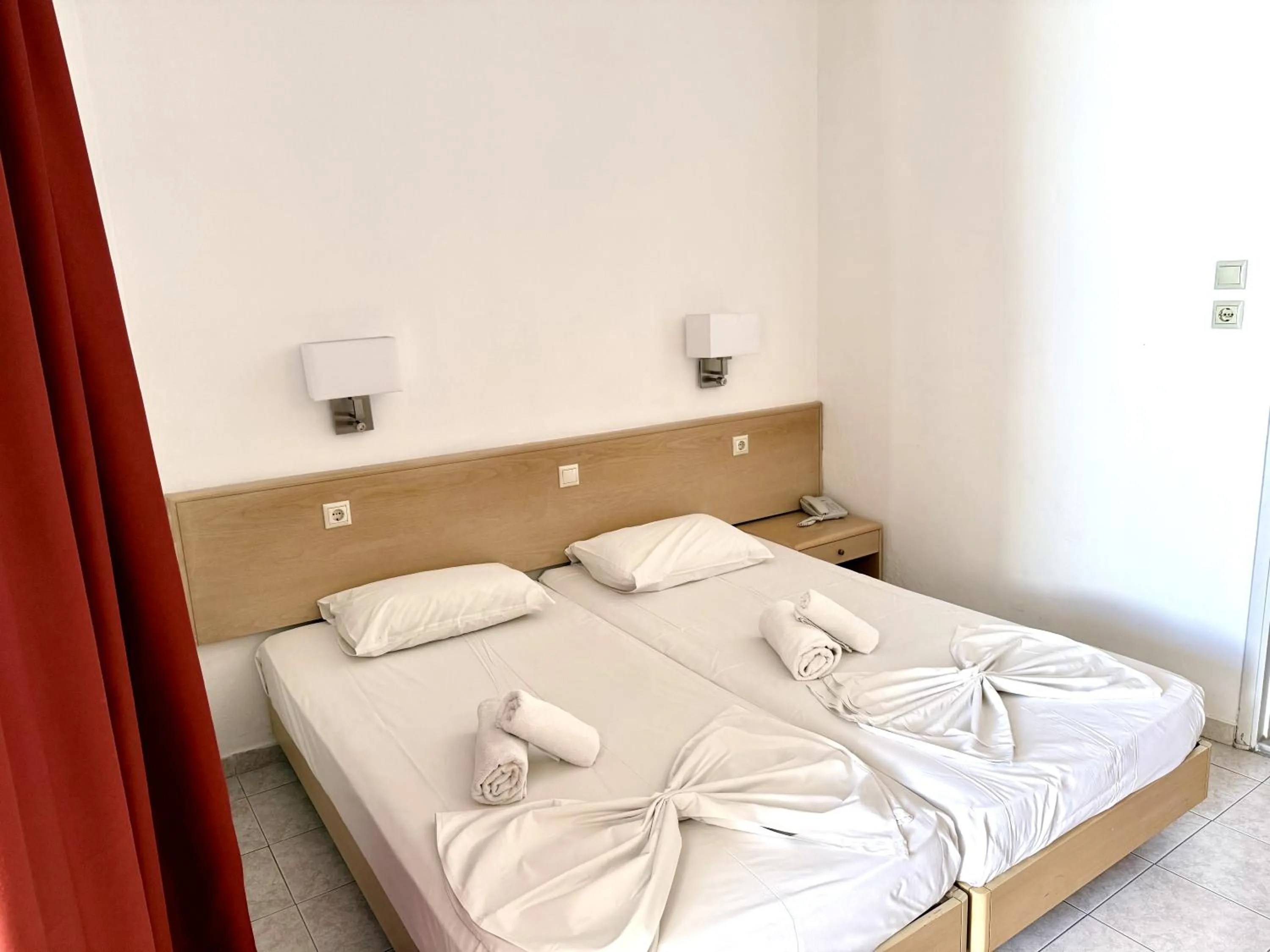 Bed in Savoy City Hotel