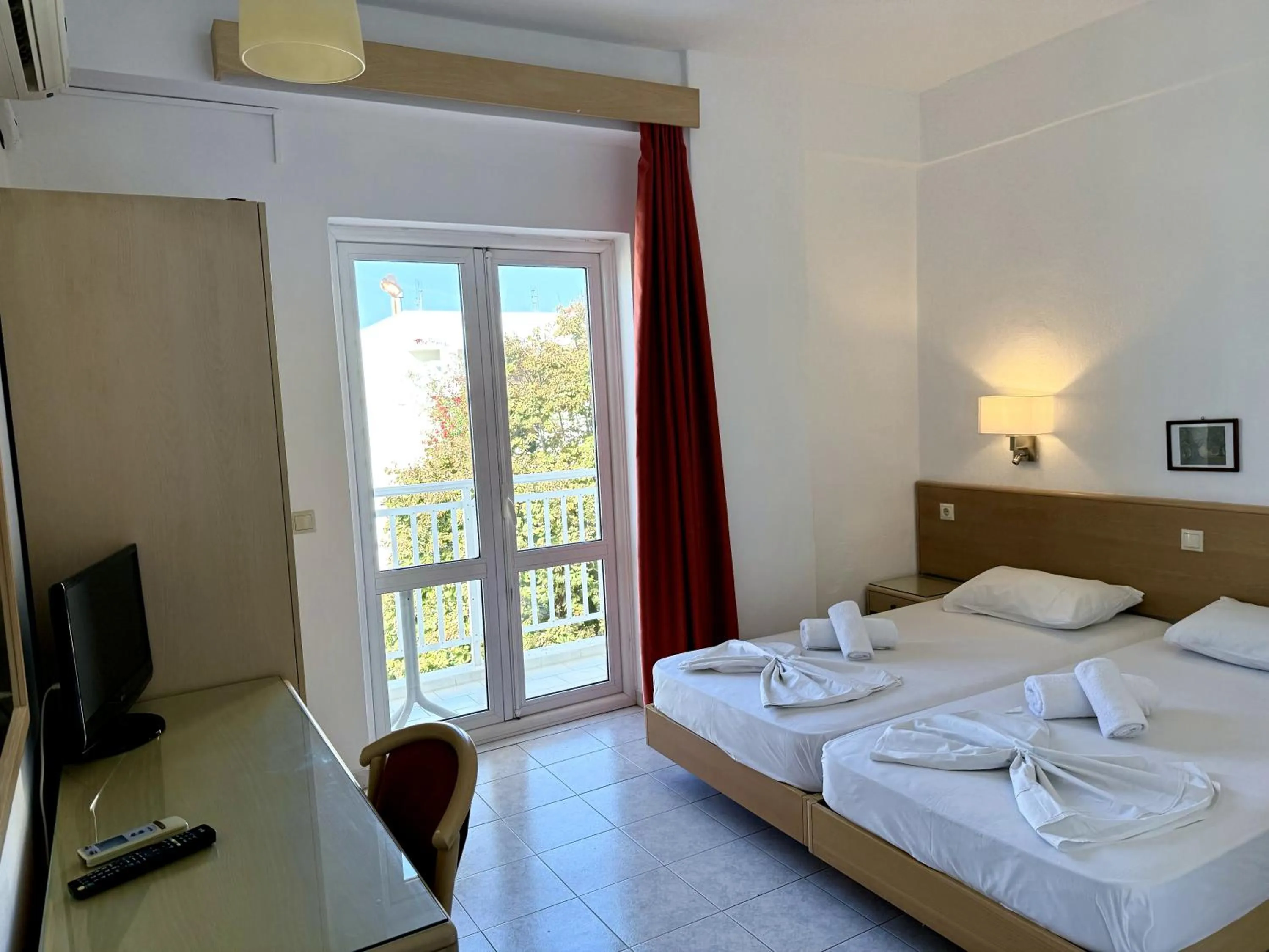 Bed in Savoy City Hotel