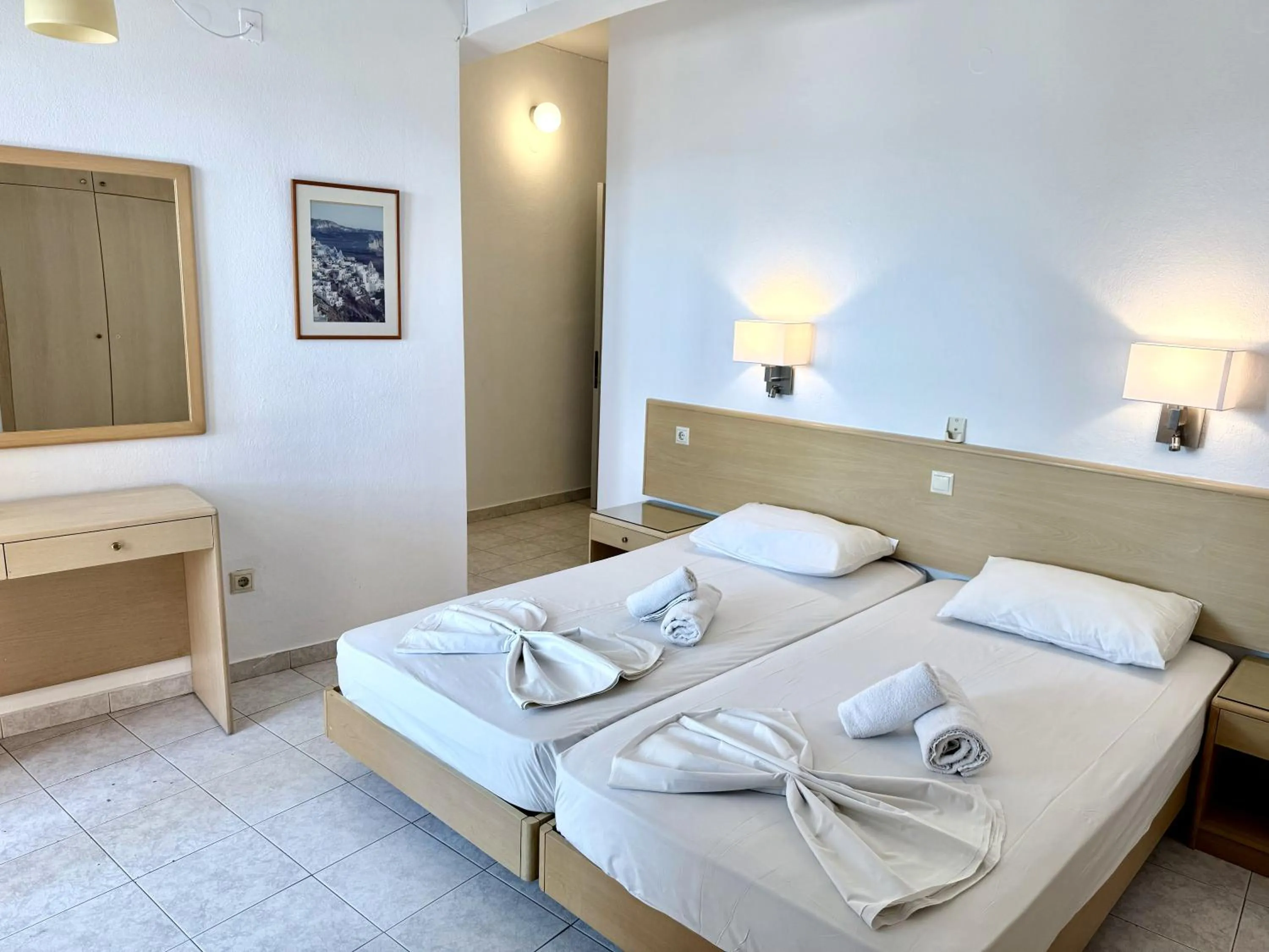 Bed in Savoy City Hotel