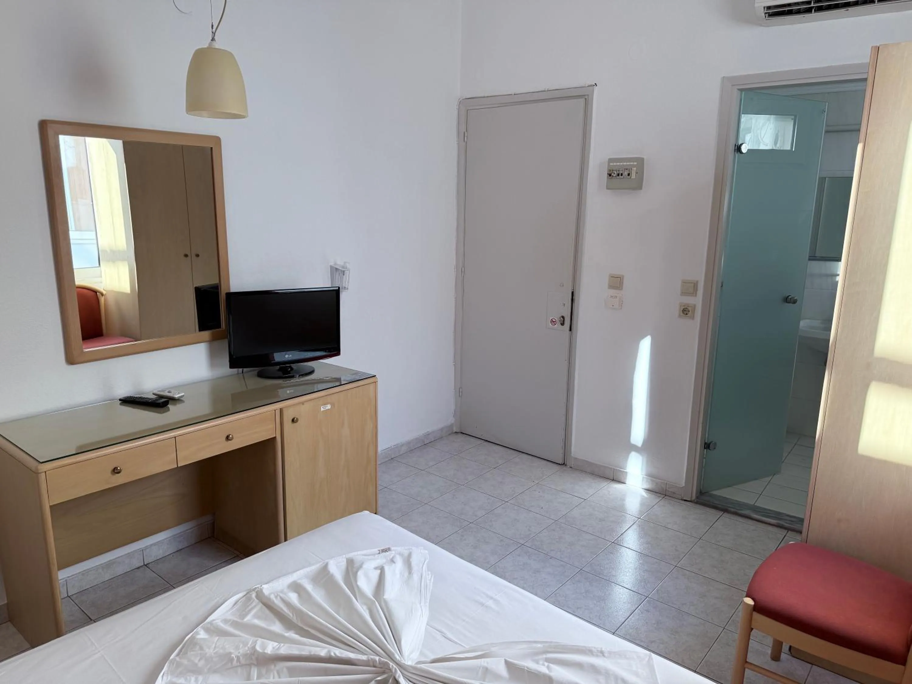 Bed in Savoy City Hotel