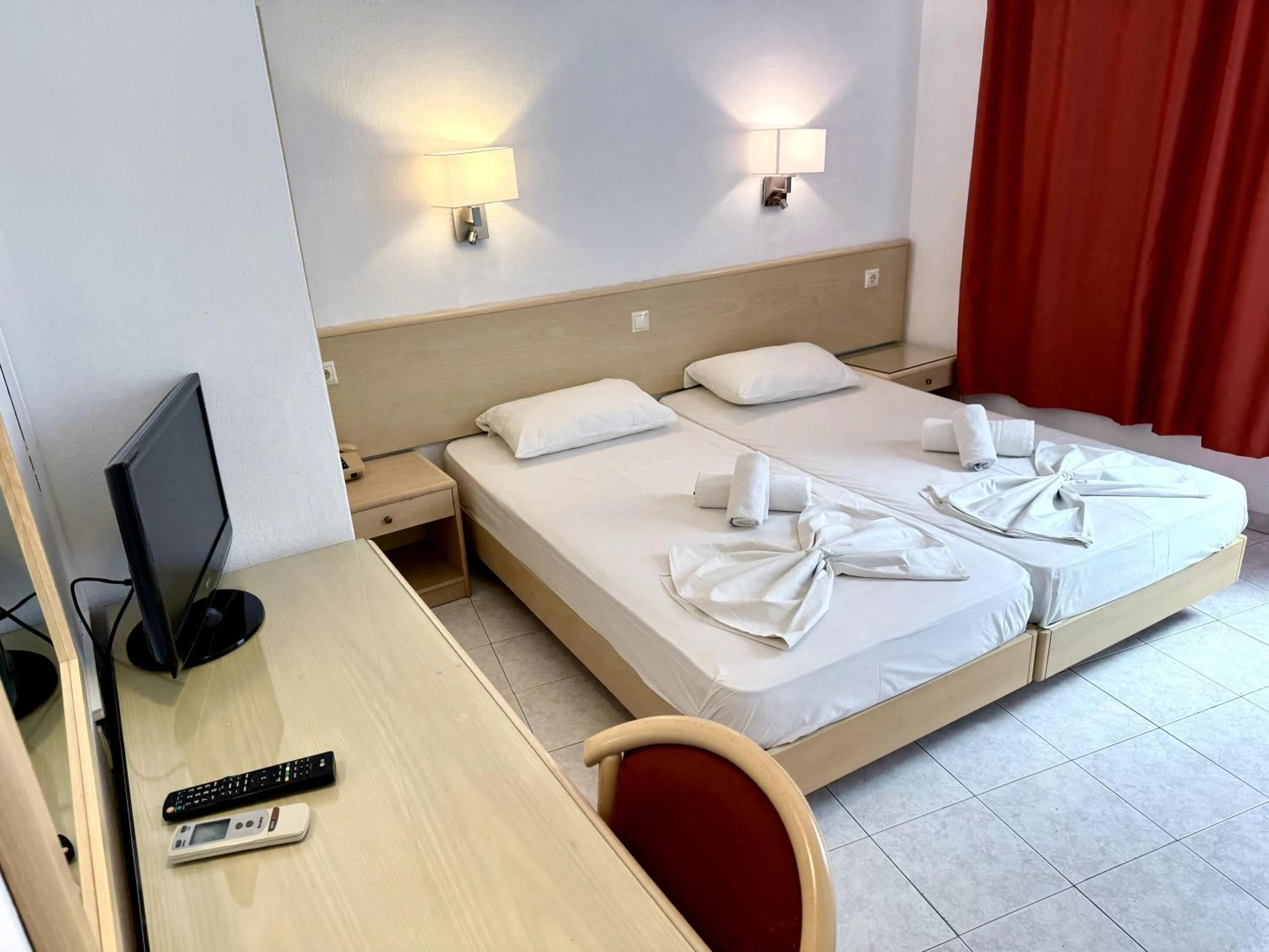 Bed in Savoy City Hotel