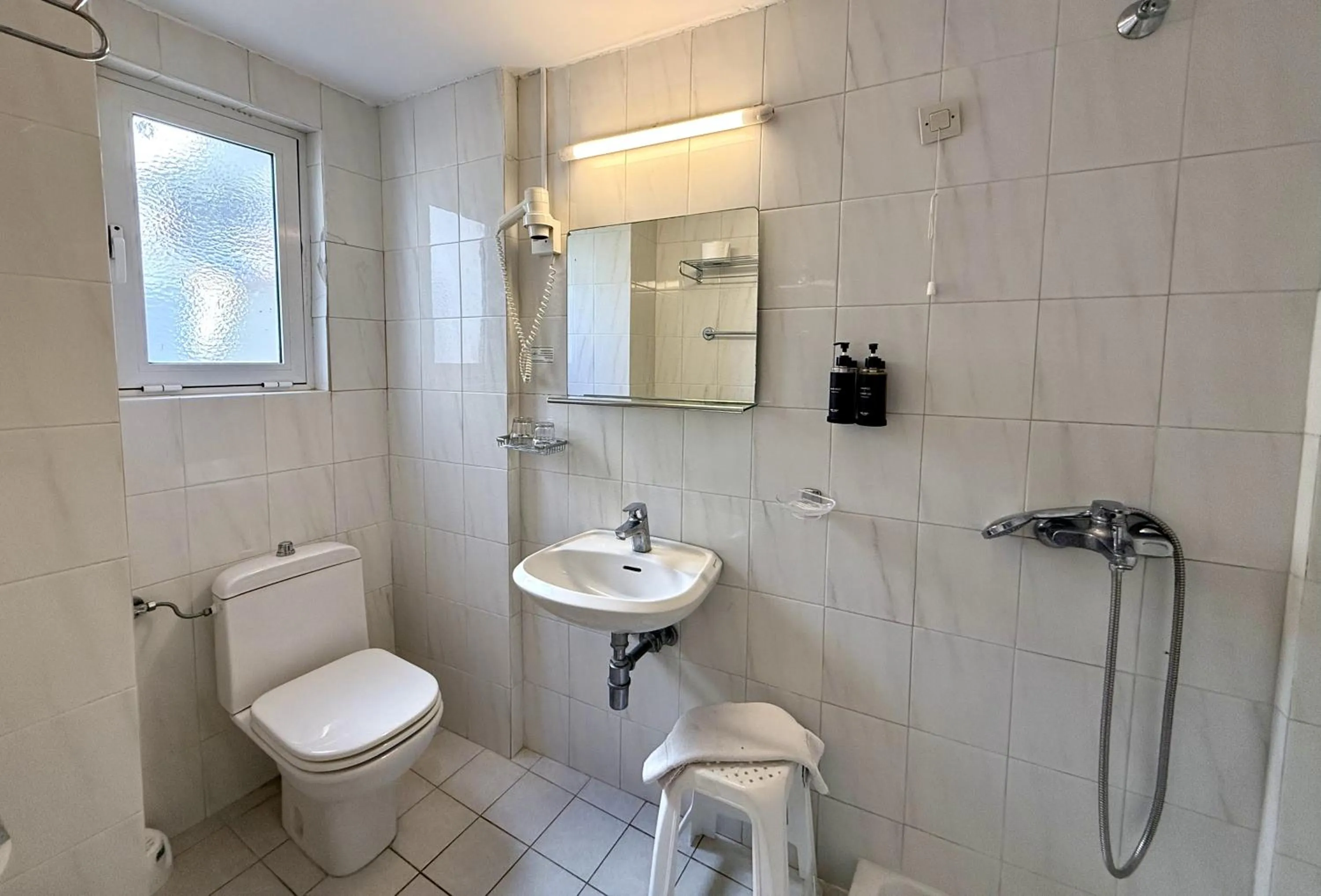 Bathroom in Savoy City Hotel