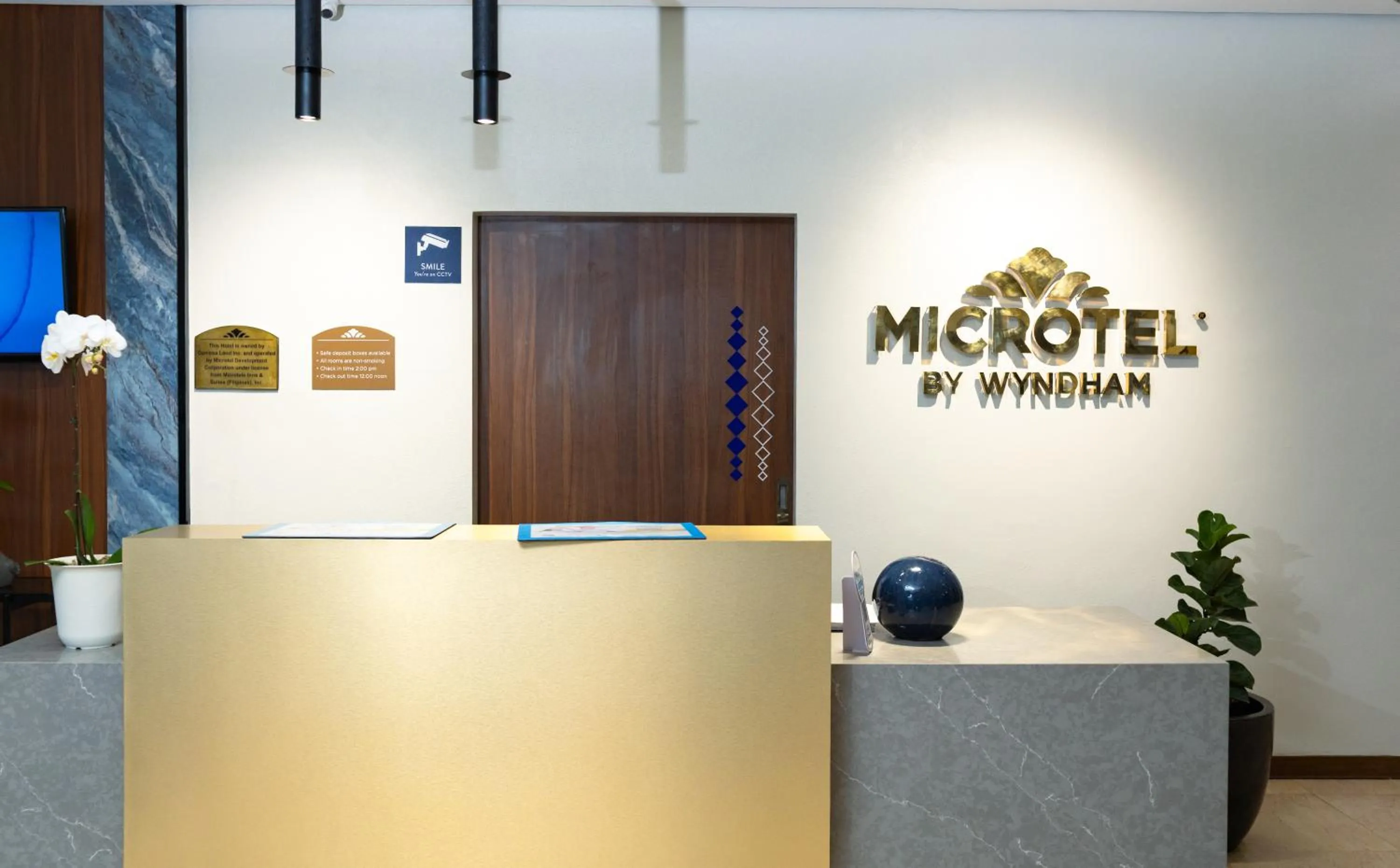 Property logo or sign in Microtel by Wyndham General Santos
