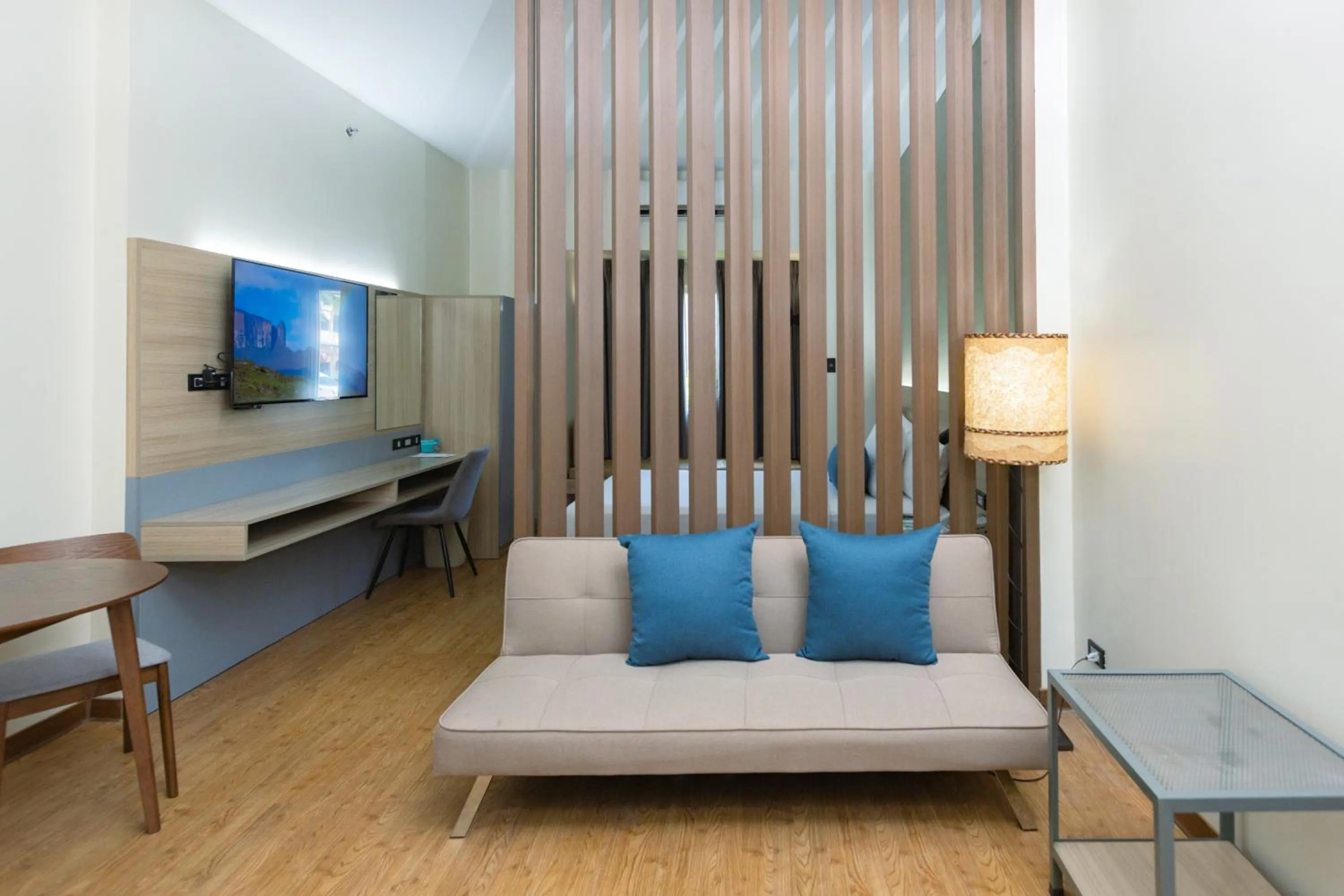 Seating area, Bed in Microtel by Wyndham General Santos