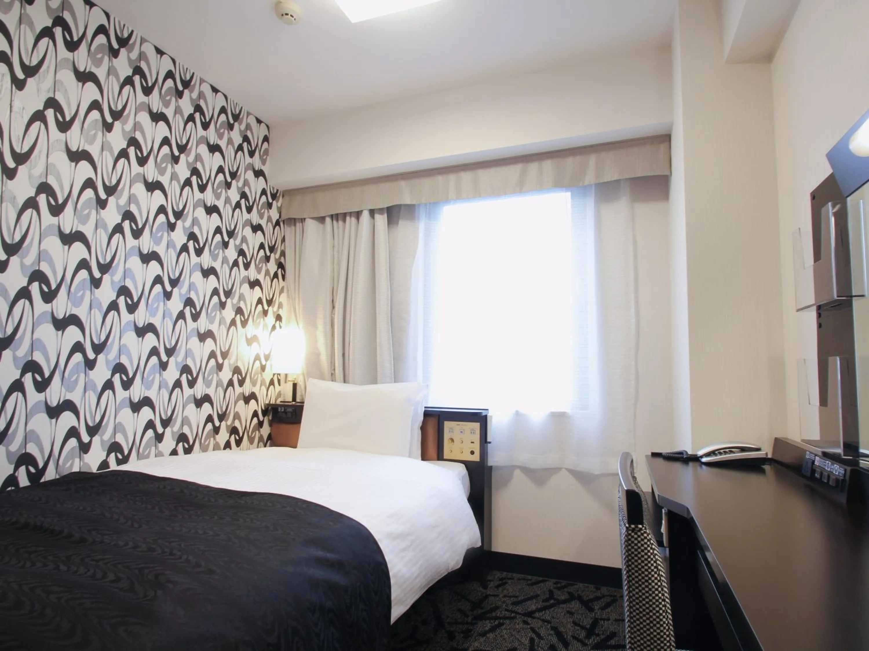 Photo of the whole room, Bed in APA Hotel Akita Senshu Koen