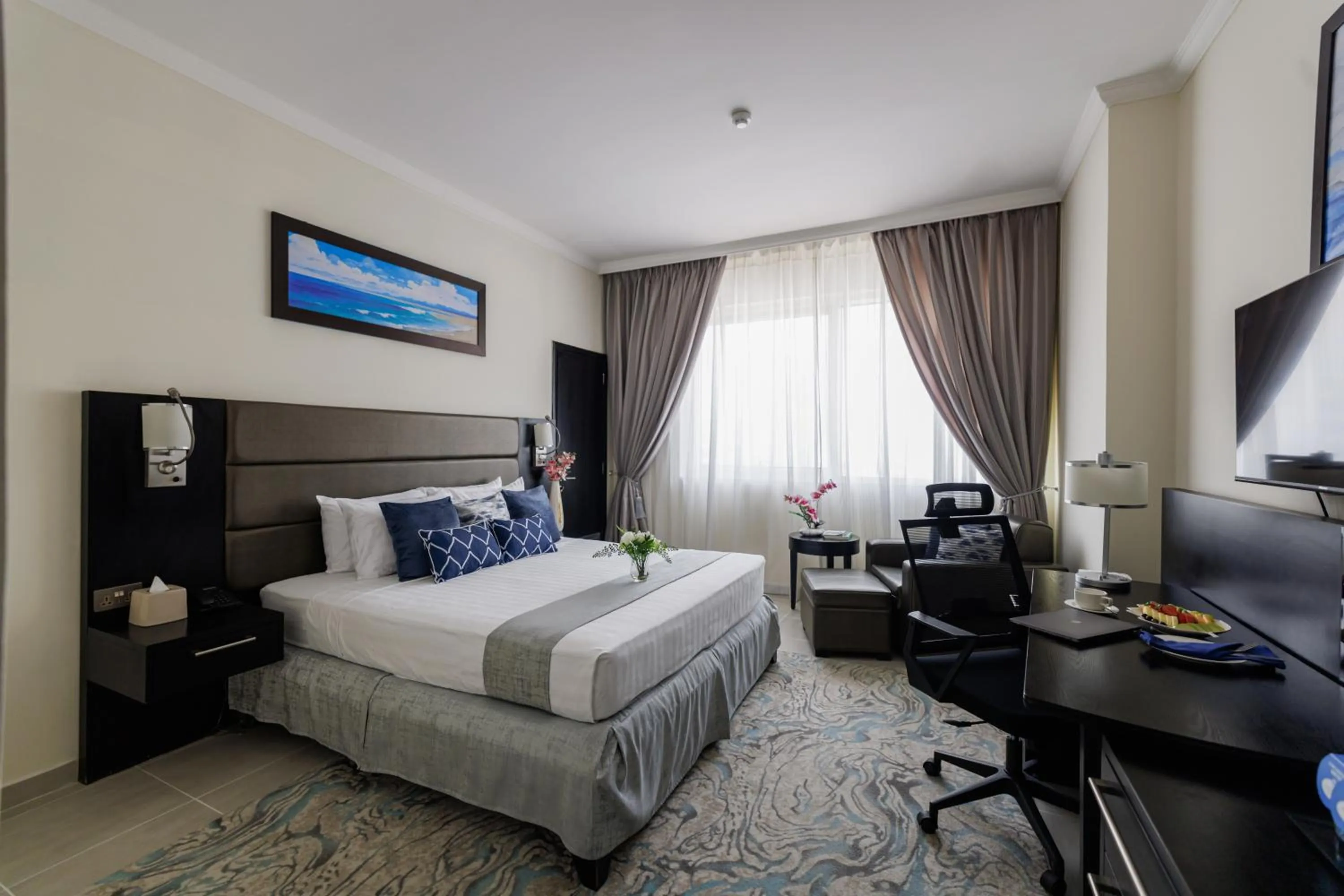 Bed in The Royal Riviera Hotel Doha