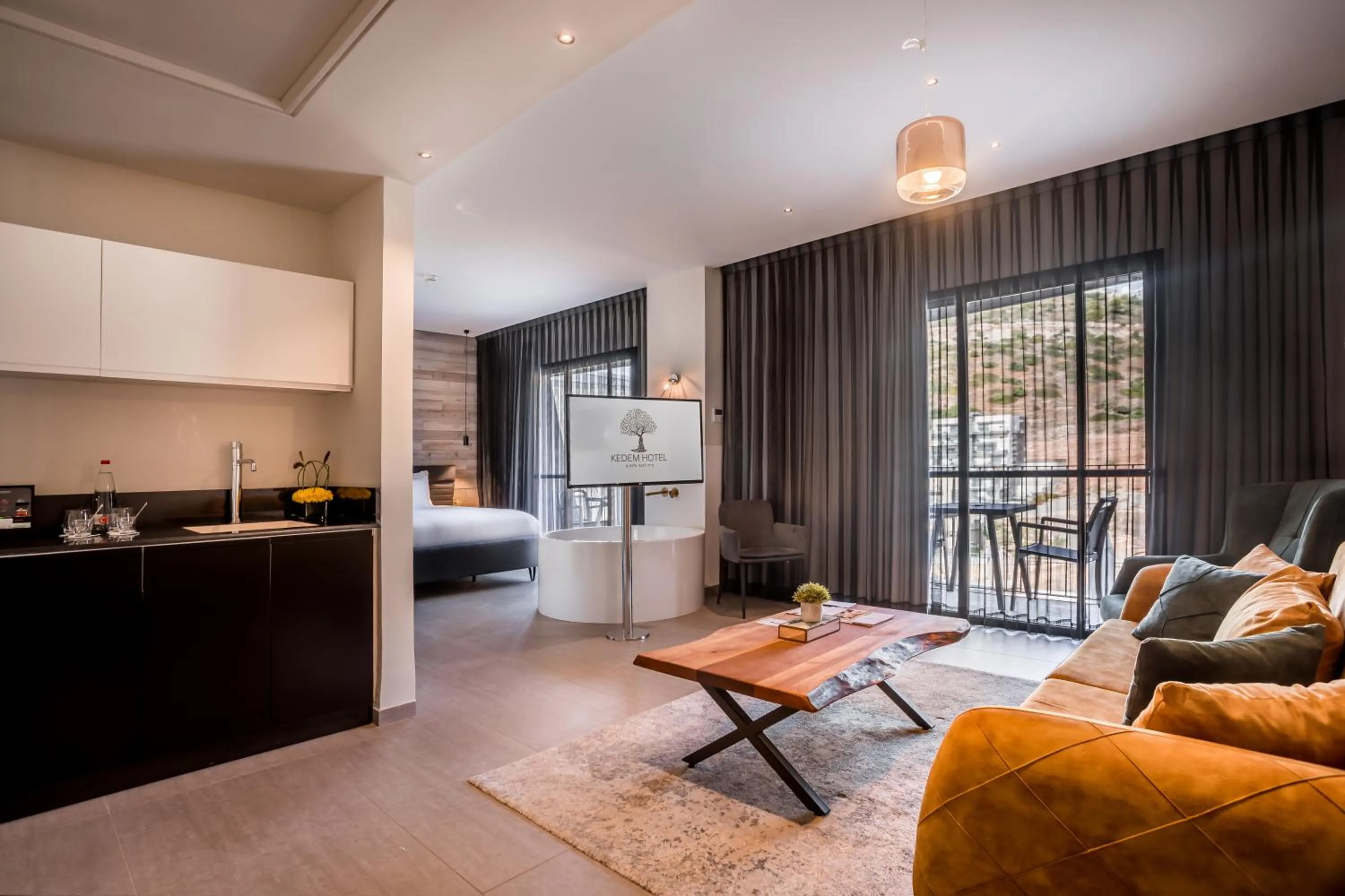 Kitchen or kitchenette, Bed in Kedem Hotel - Adults Only