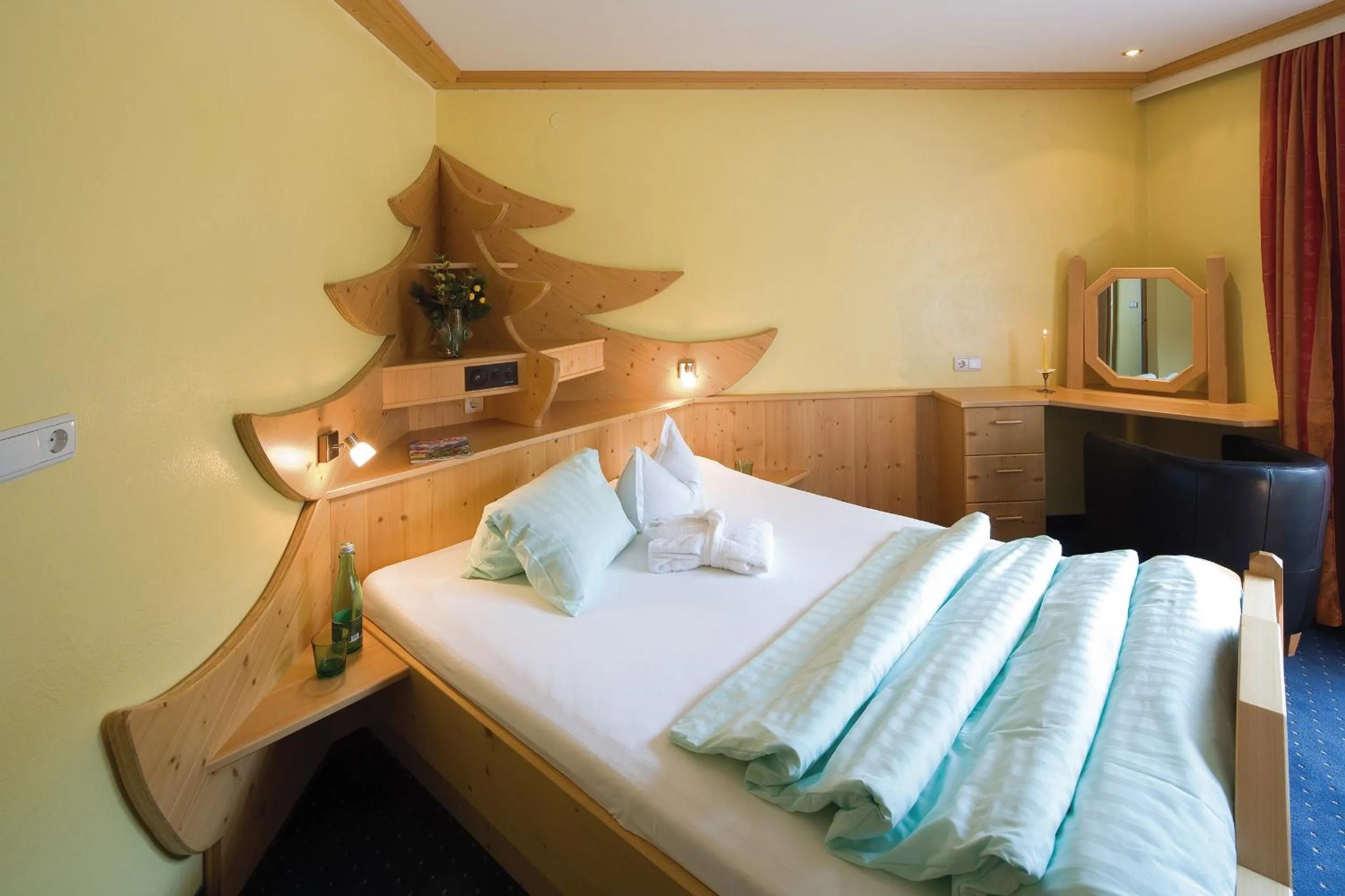 Bed in Hotel Achentalerhof