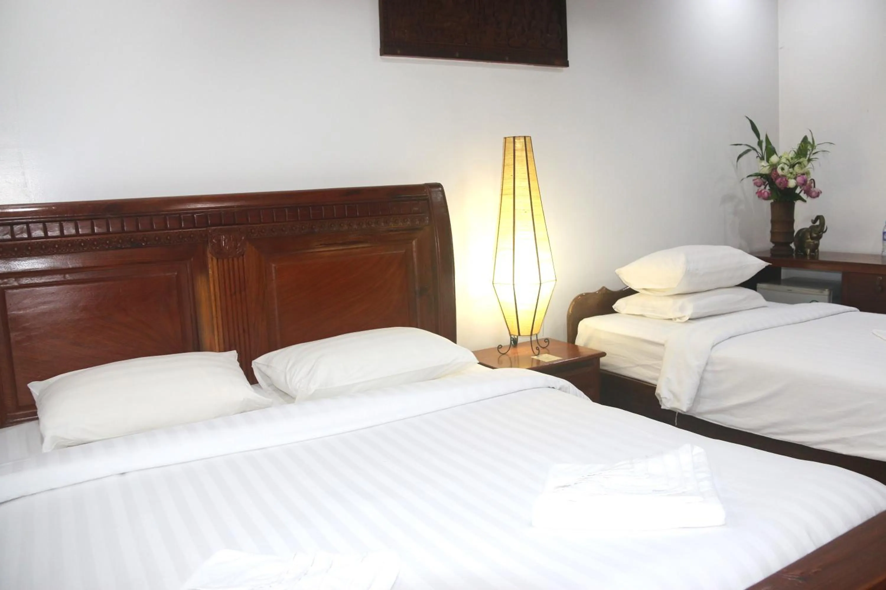 Bed in Shining Angkor Apartment Hotel