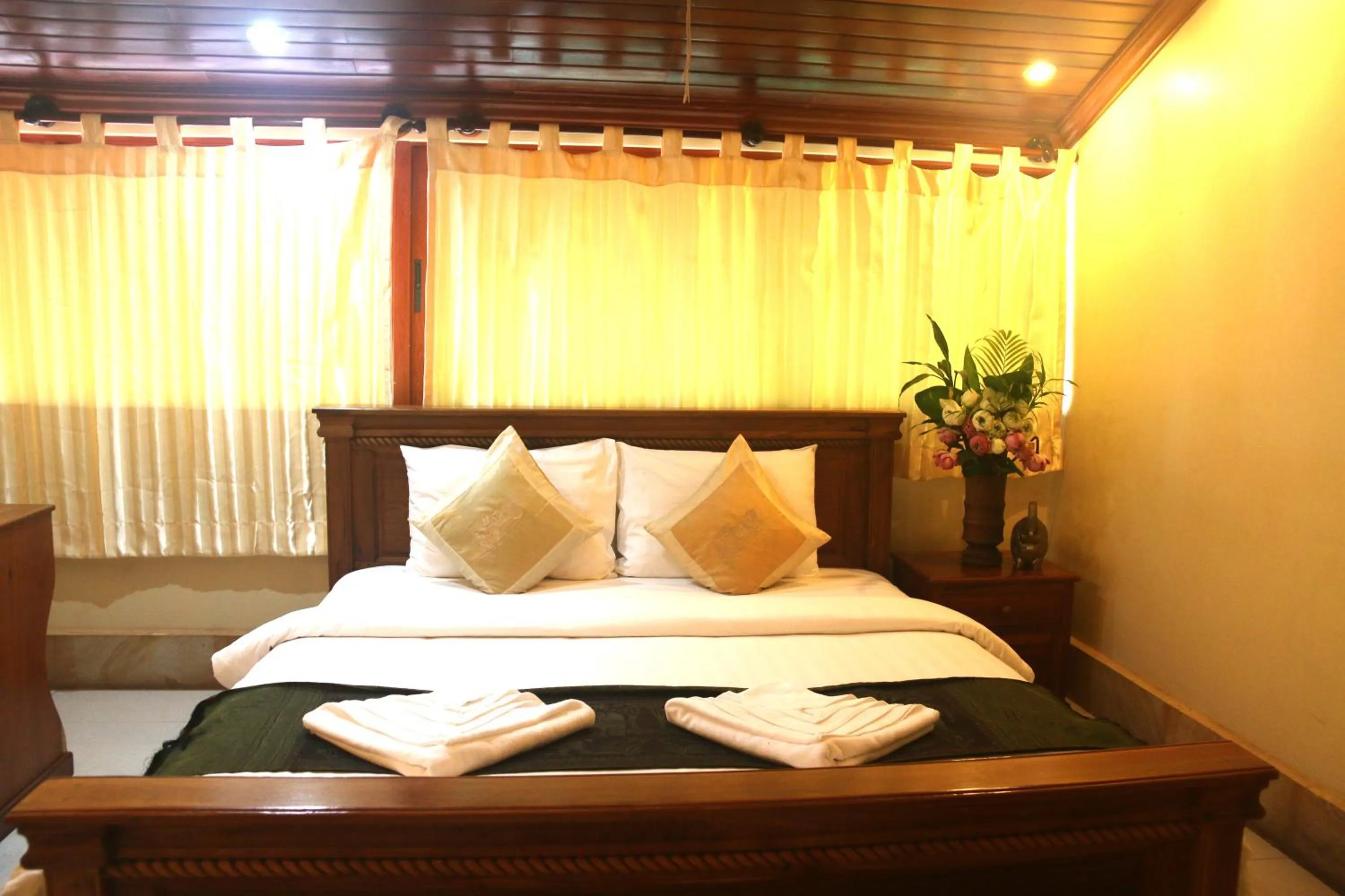 Bed in Shining Angkor Apartment Hotel