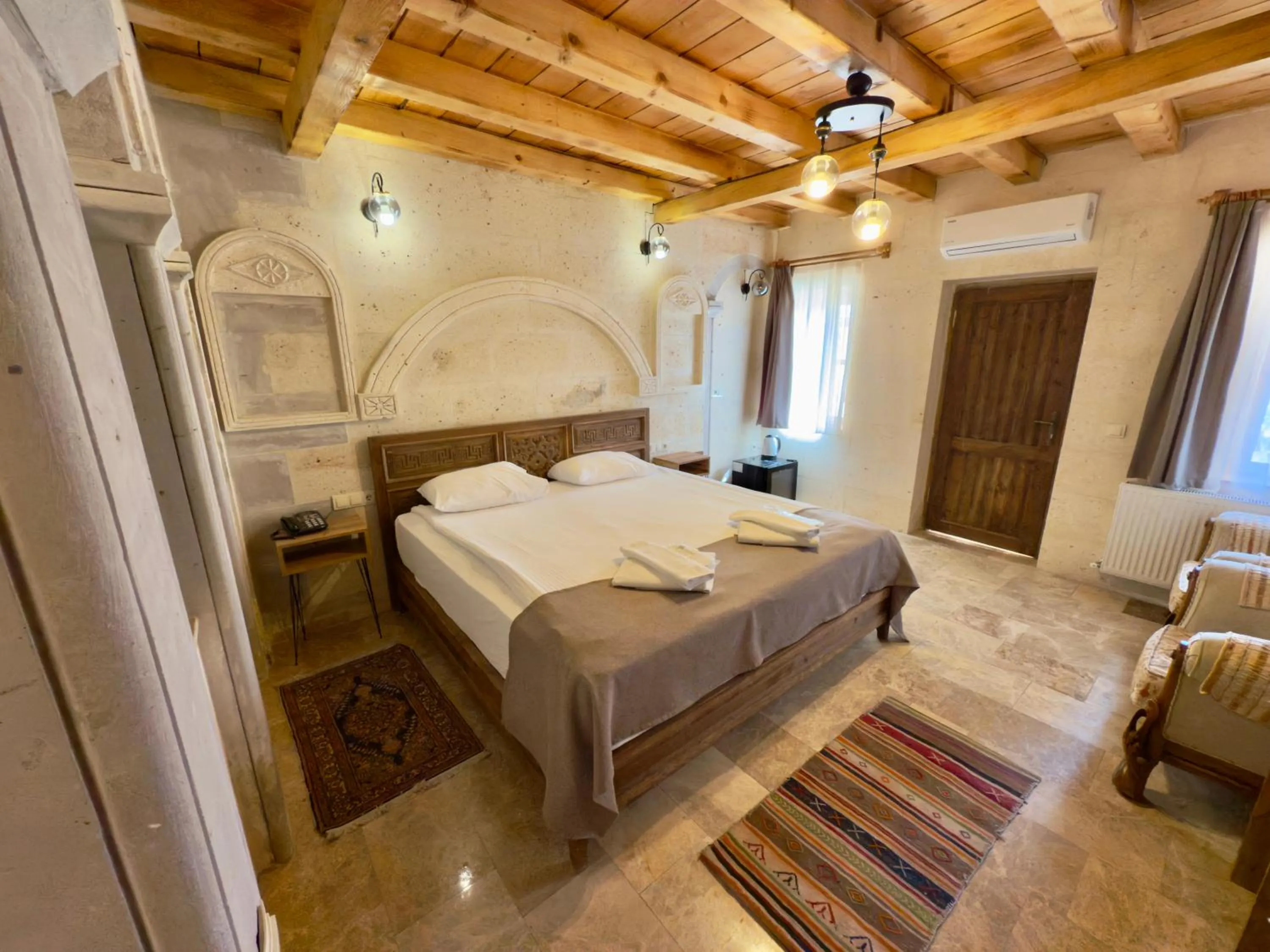 Photo of the whole room, Bed in Cappadocia Caves Hotel