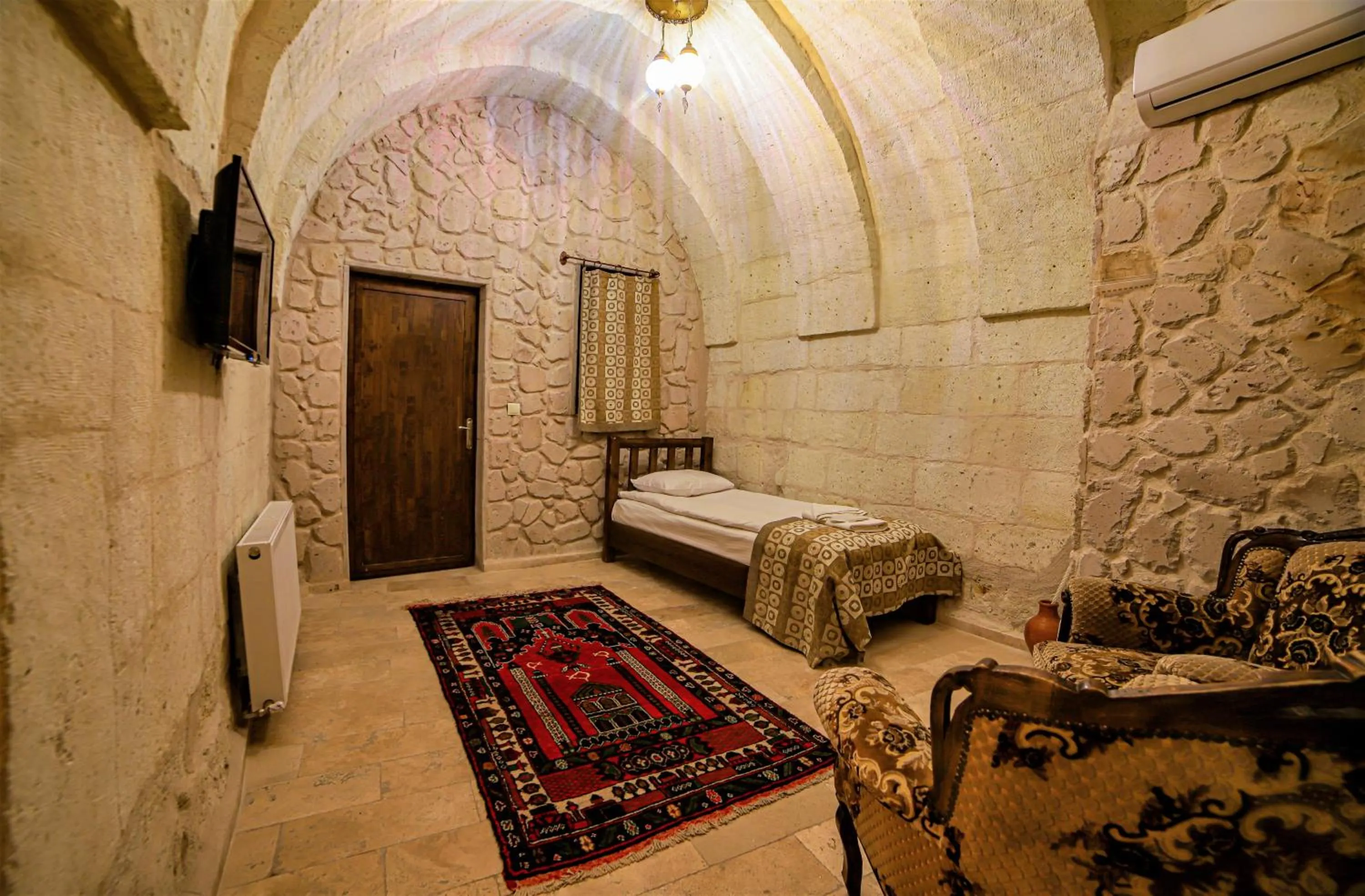 Bed in Cappadocia Caves Hotel