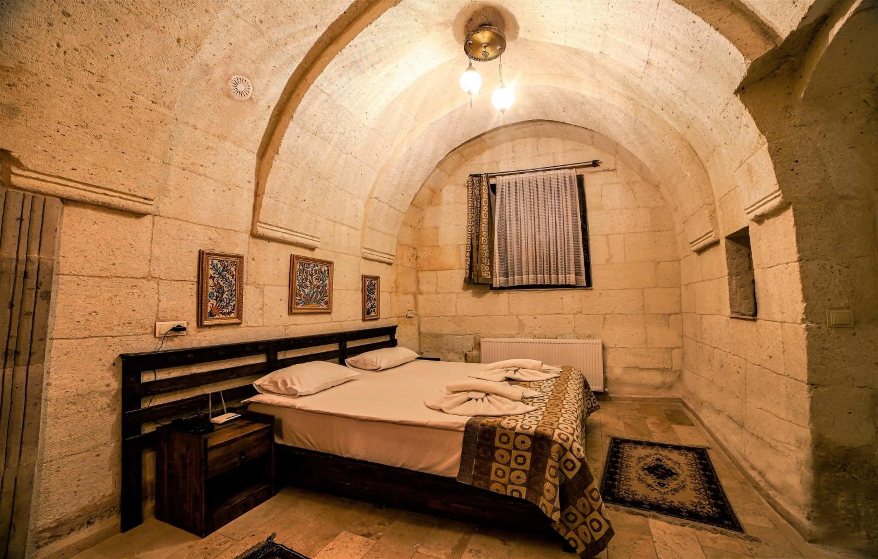 Bed in Cappadocia Caves Hotel