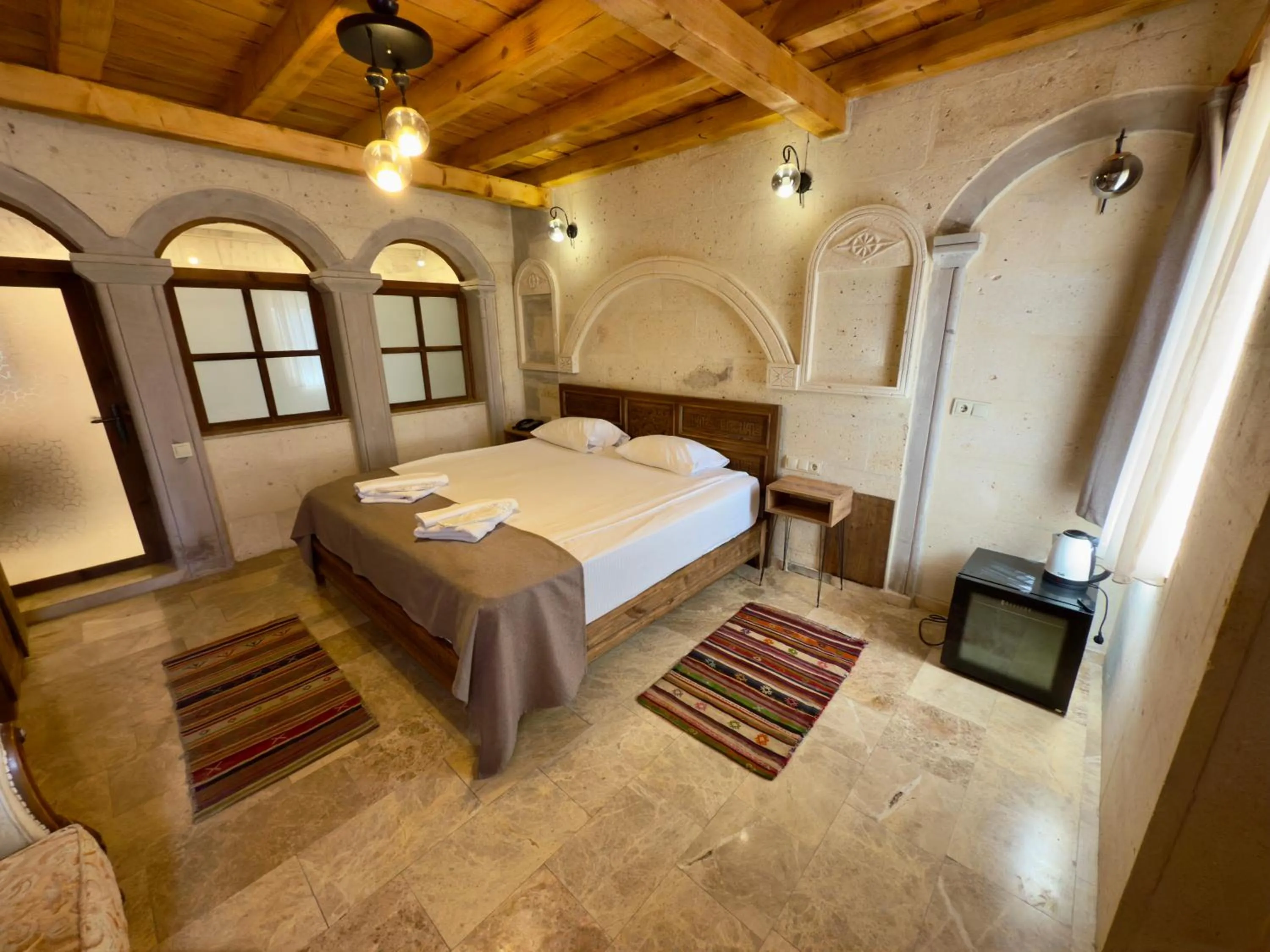 minibar, Bed in Cappadocia Caves Hotel