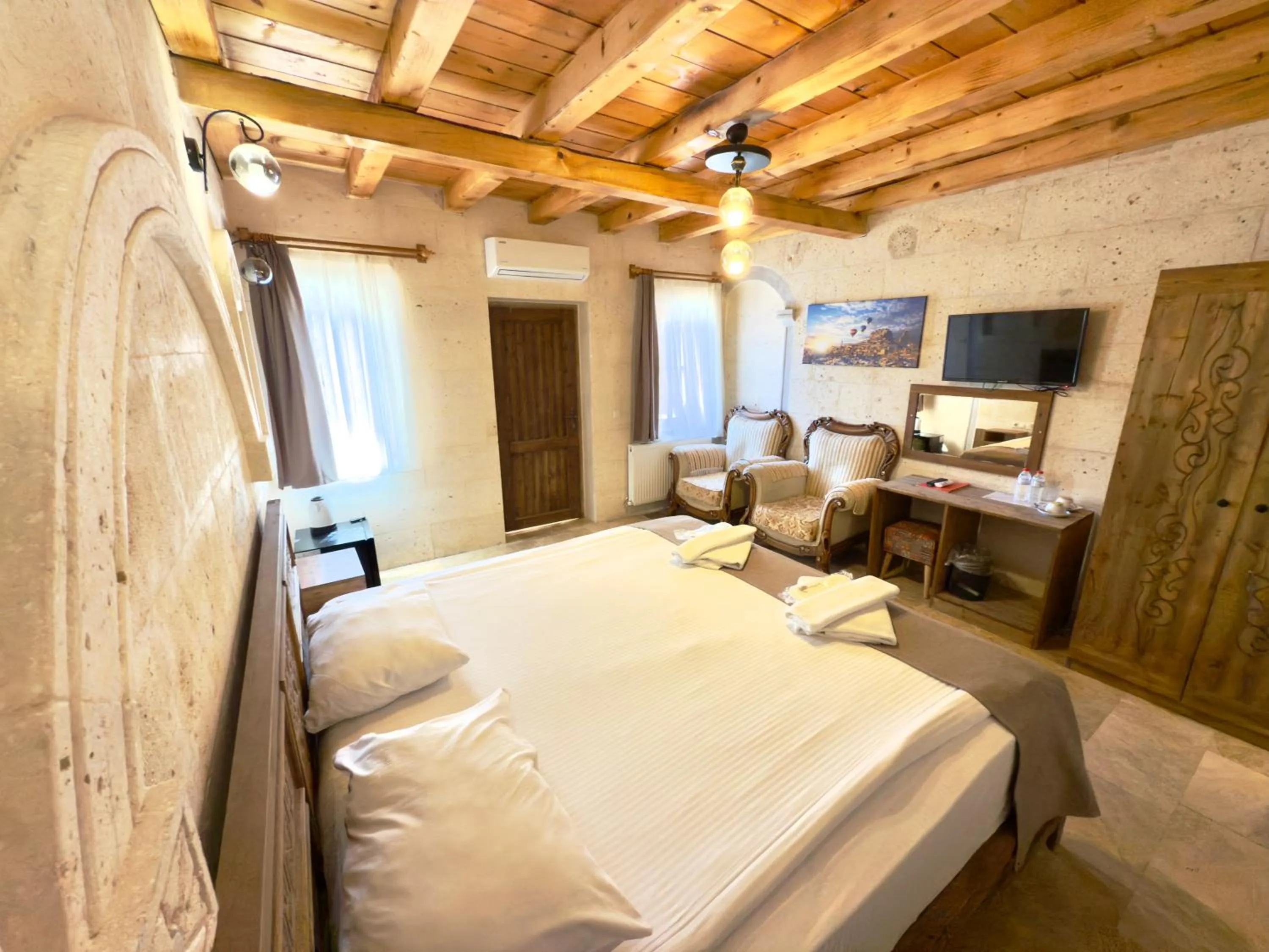 Bed in Cappadocia Caves Hotel